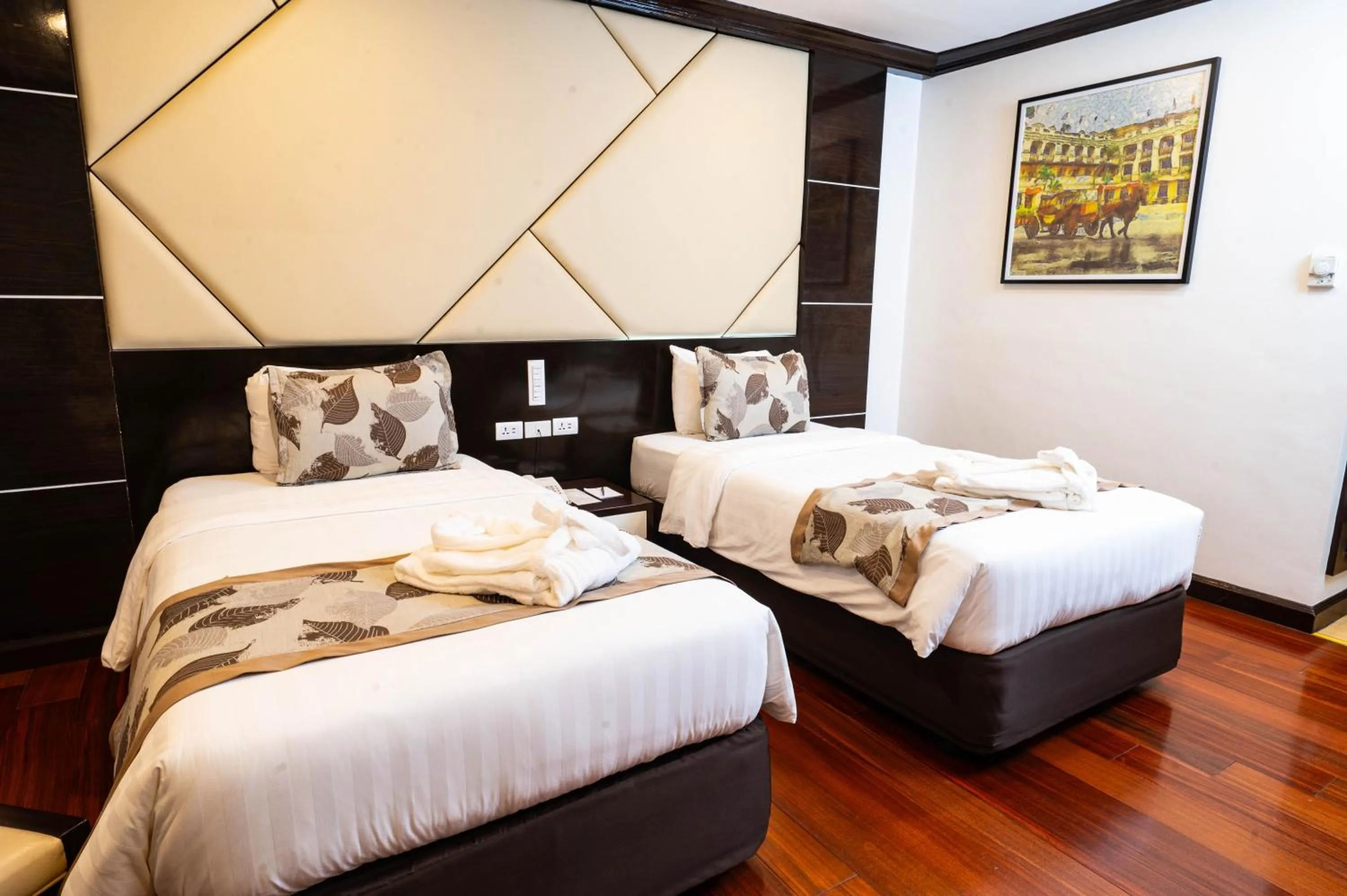 Bed in The Apo View Hotel