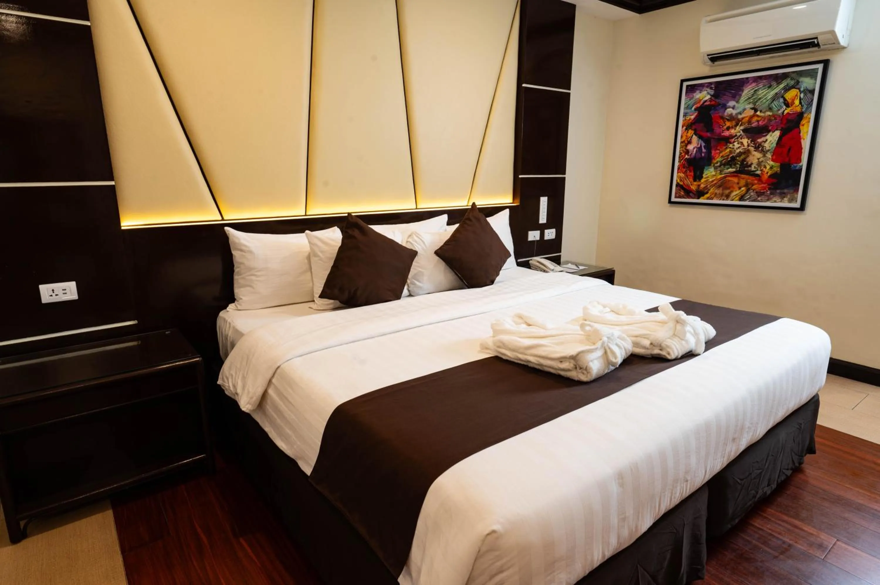 Bed in The Apo View Hotel