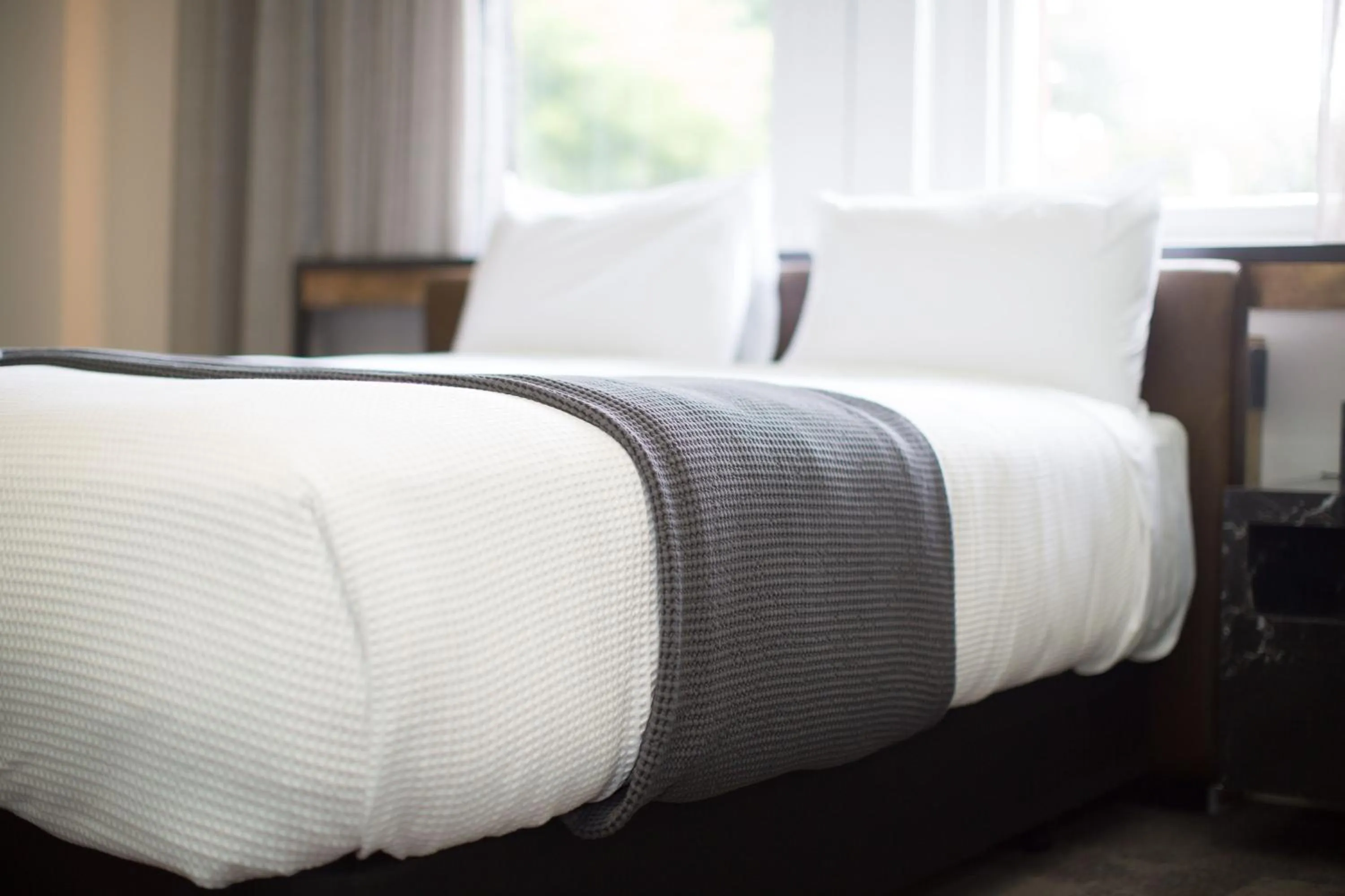 Bed in Clarence Boutique Hotel