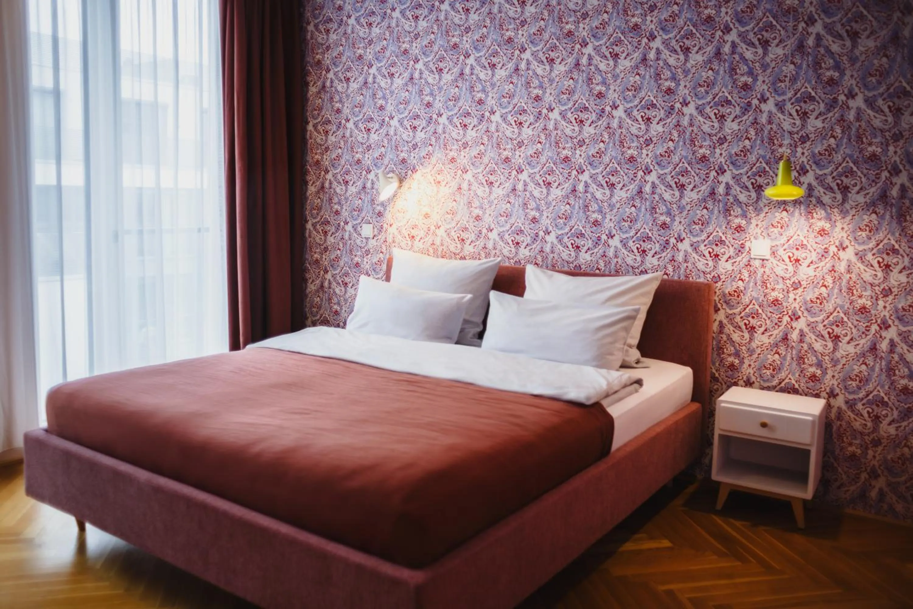 Bed in The Circus Apartments