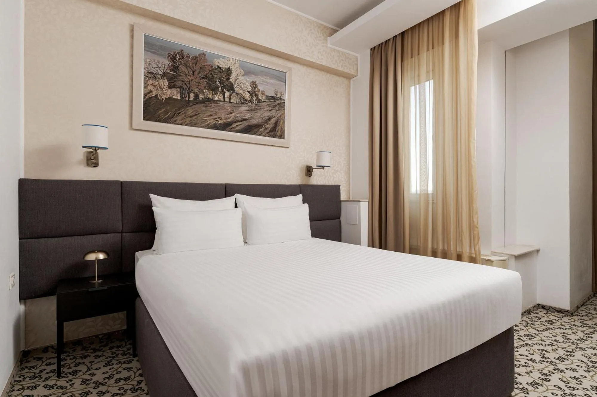 Bed in Crystal Palace Hotel