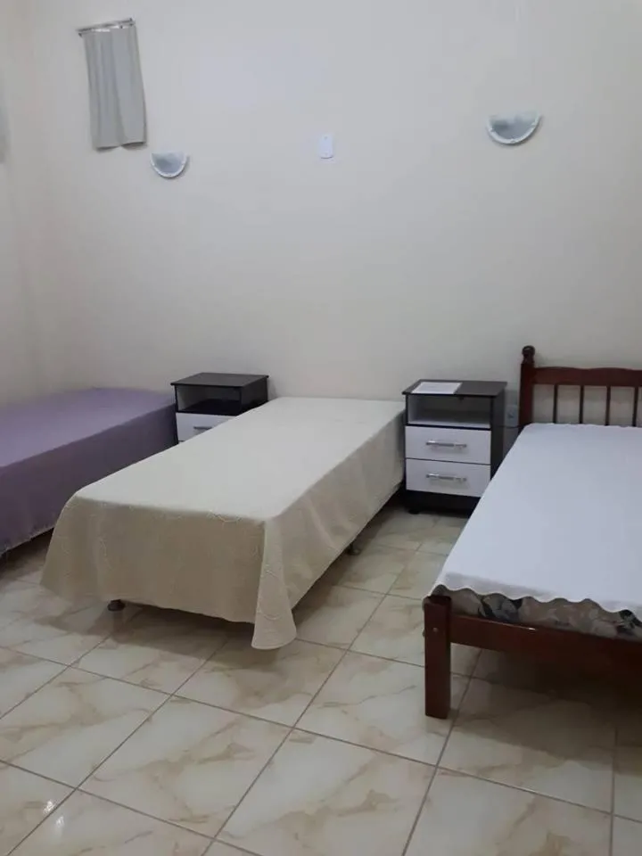 Bed in Hospedagem Narcizo