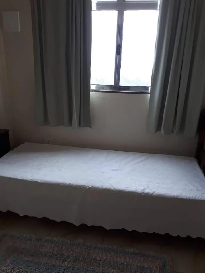 Bed in Hospedagem Narcizo