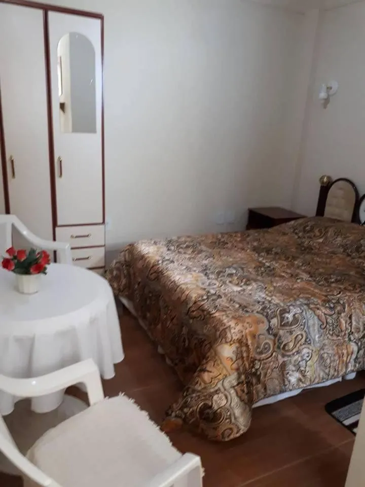 Bed in Hospedagem Narcizo