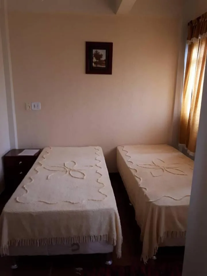 Bed in Hospedagem Narcizo