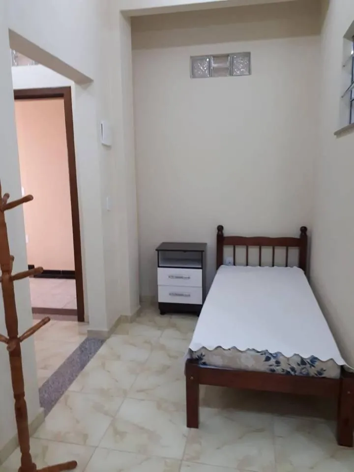 Bed in Hospedagem Narcizo