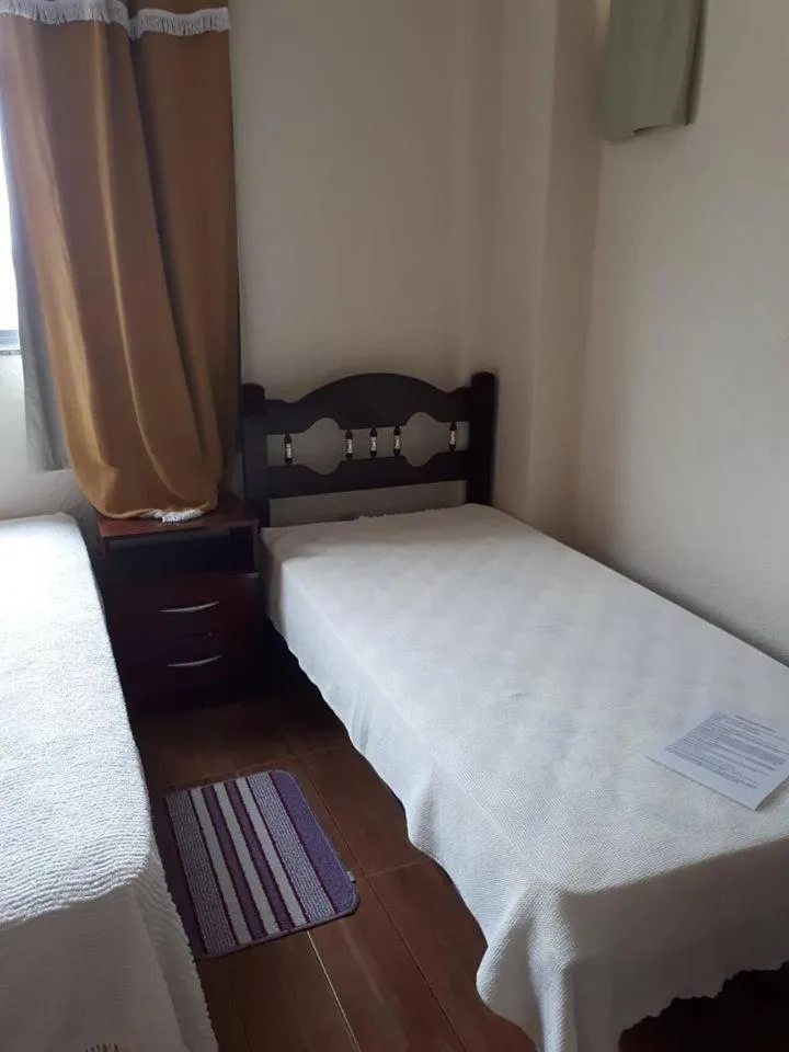 Bed in Hospedagem Narcizo