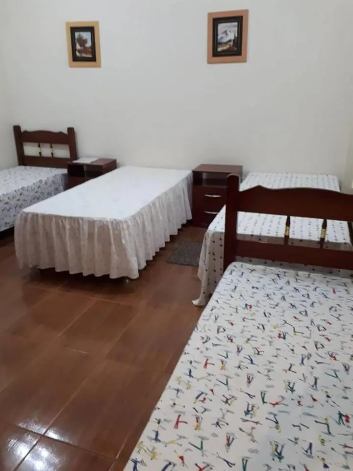 Bed in Hospedagem Narcizo