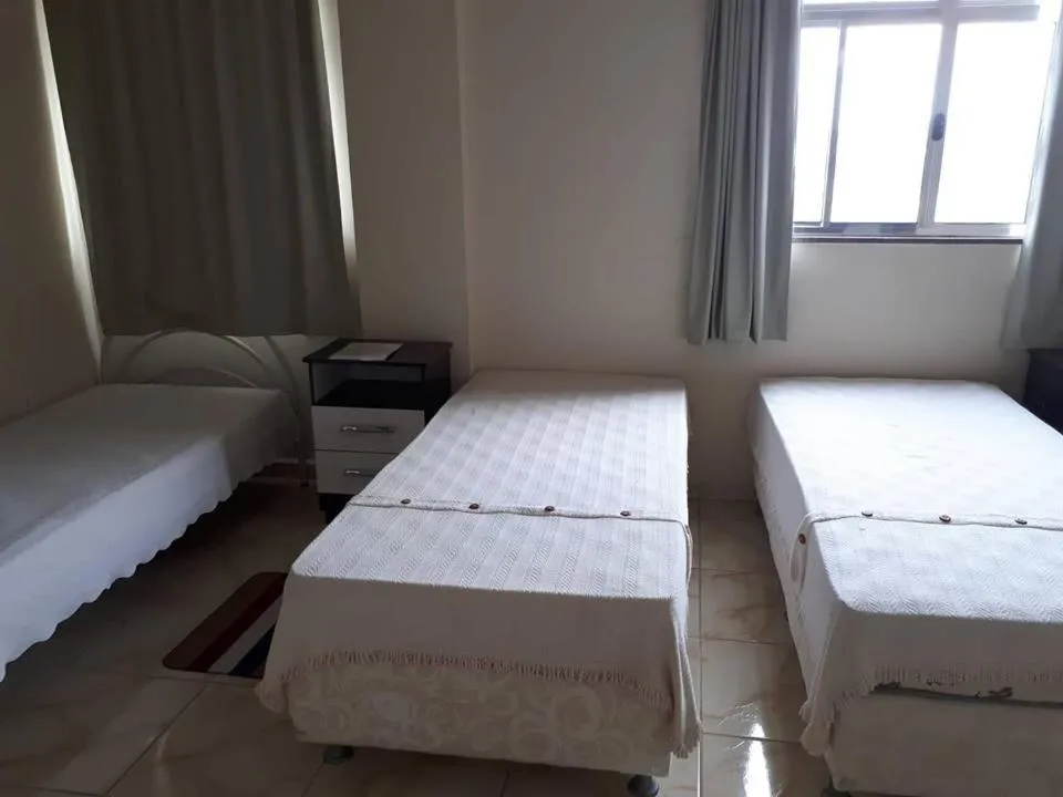 Bed in Hospedagem Narcizo