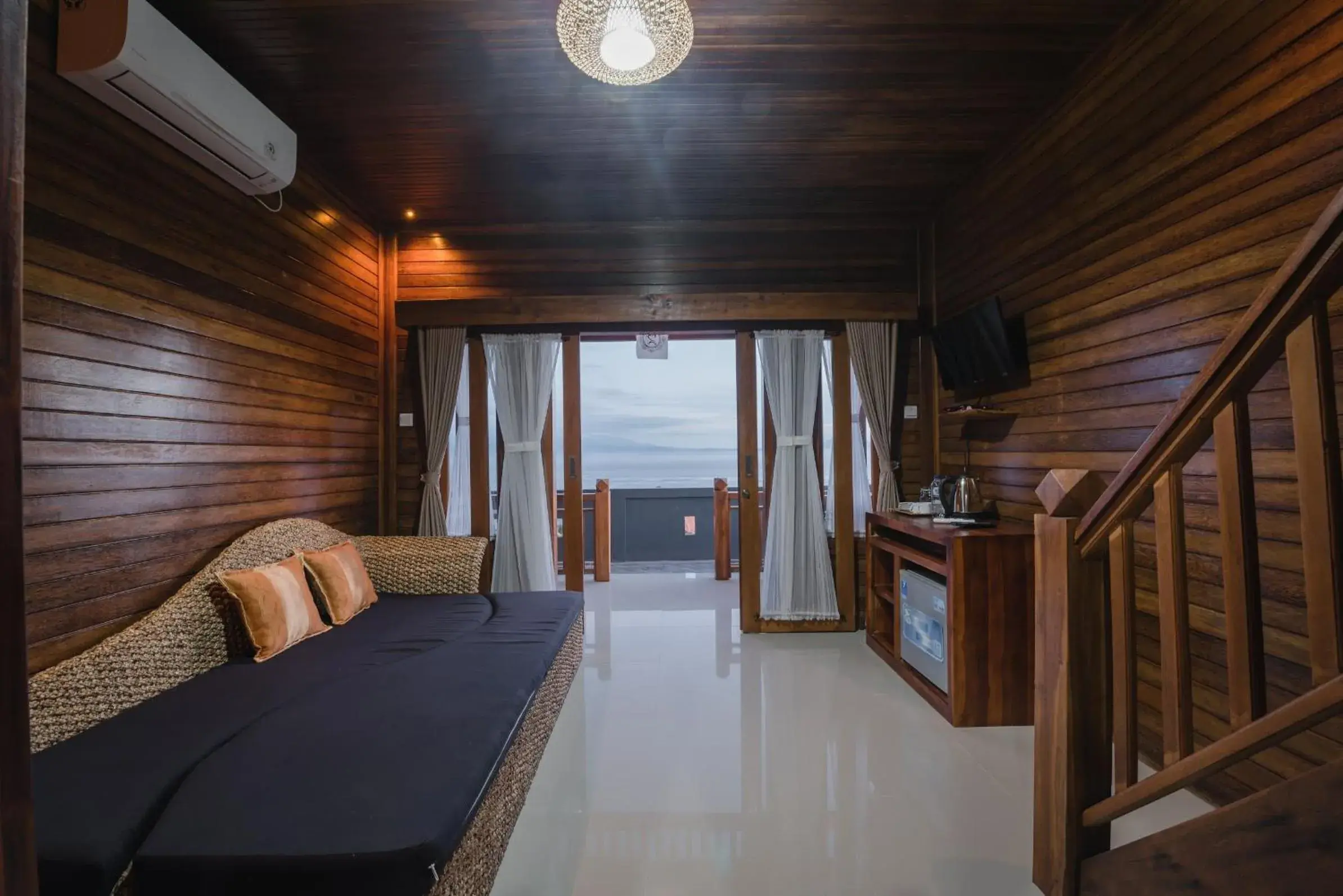 Living room, Bed in Daphila Cottage Living room, Bed in Daphila Cottage