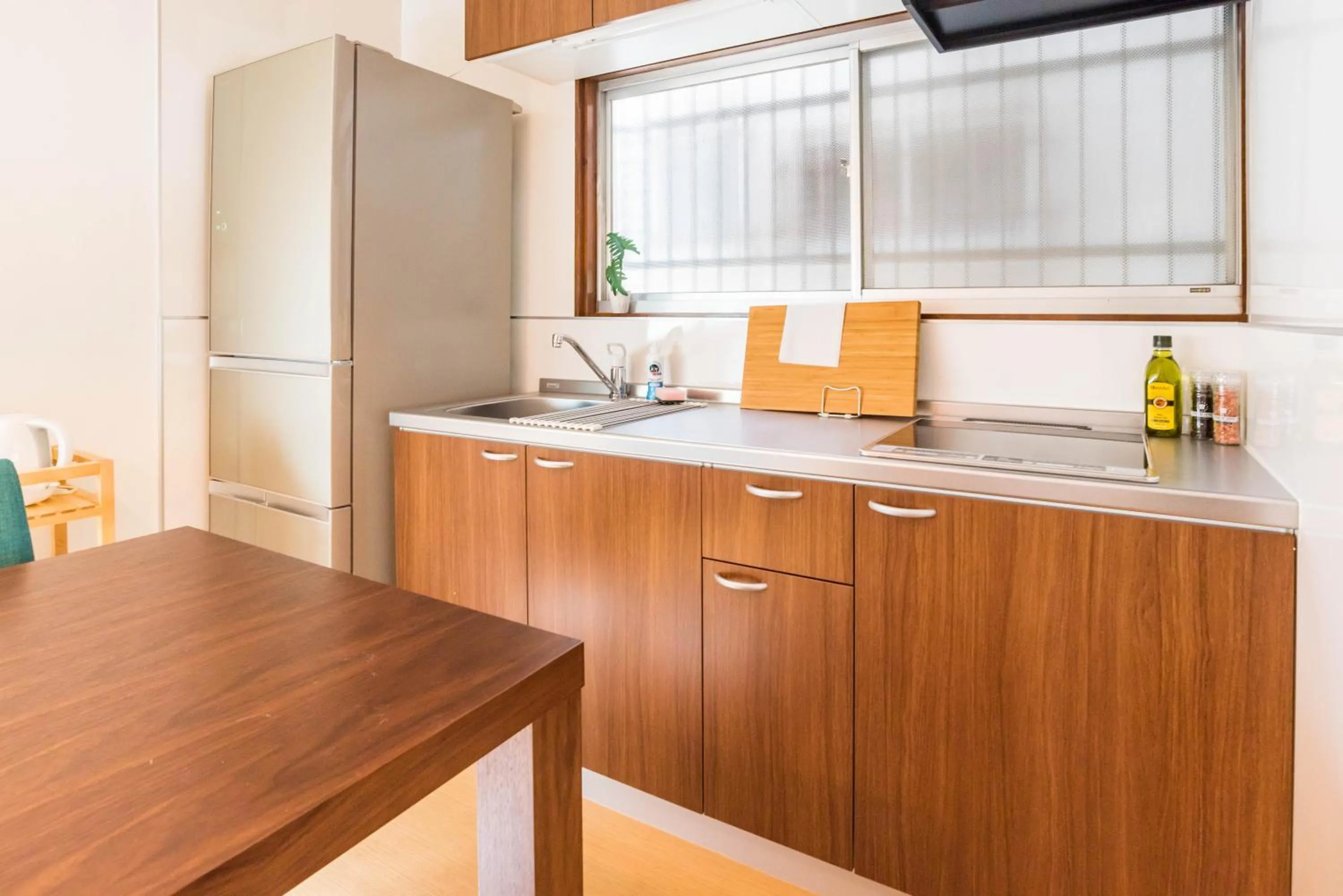 Kitchen or kitchenette in Tino Kawara