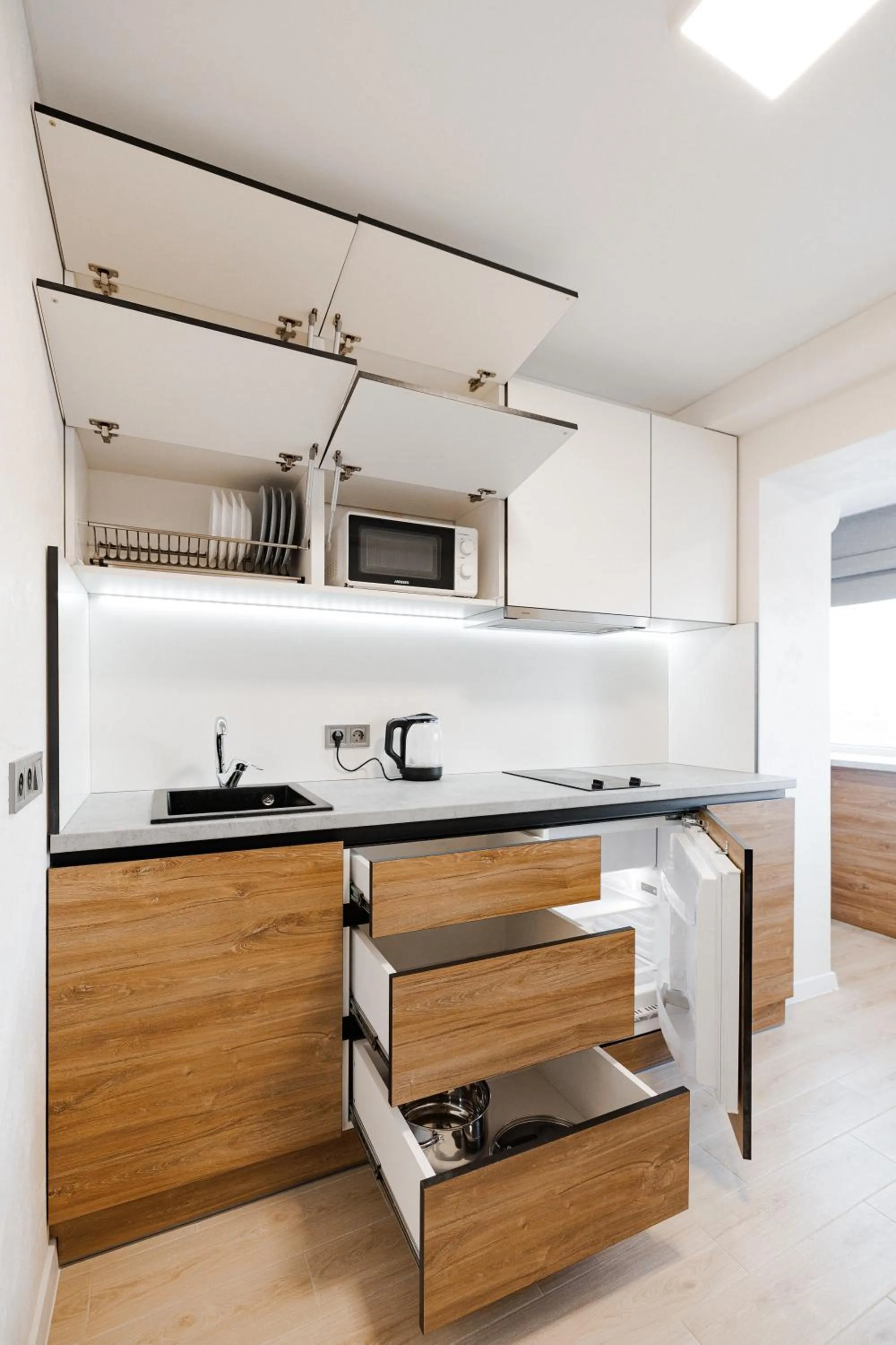 Kitchen or kitchenette in CityApartments Kyiv Obolon