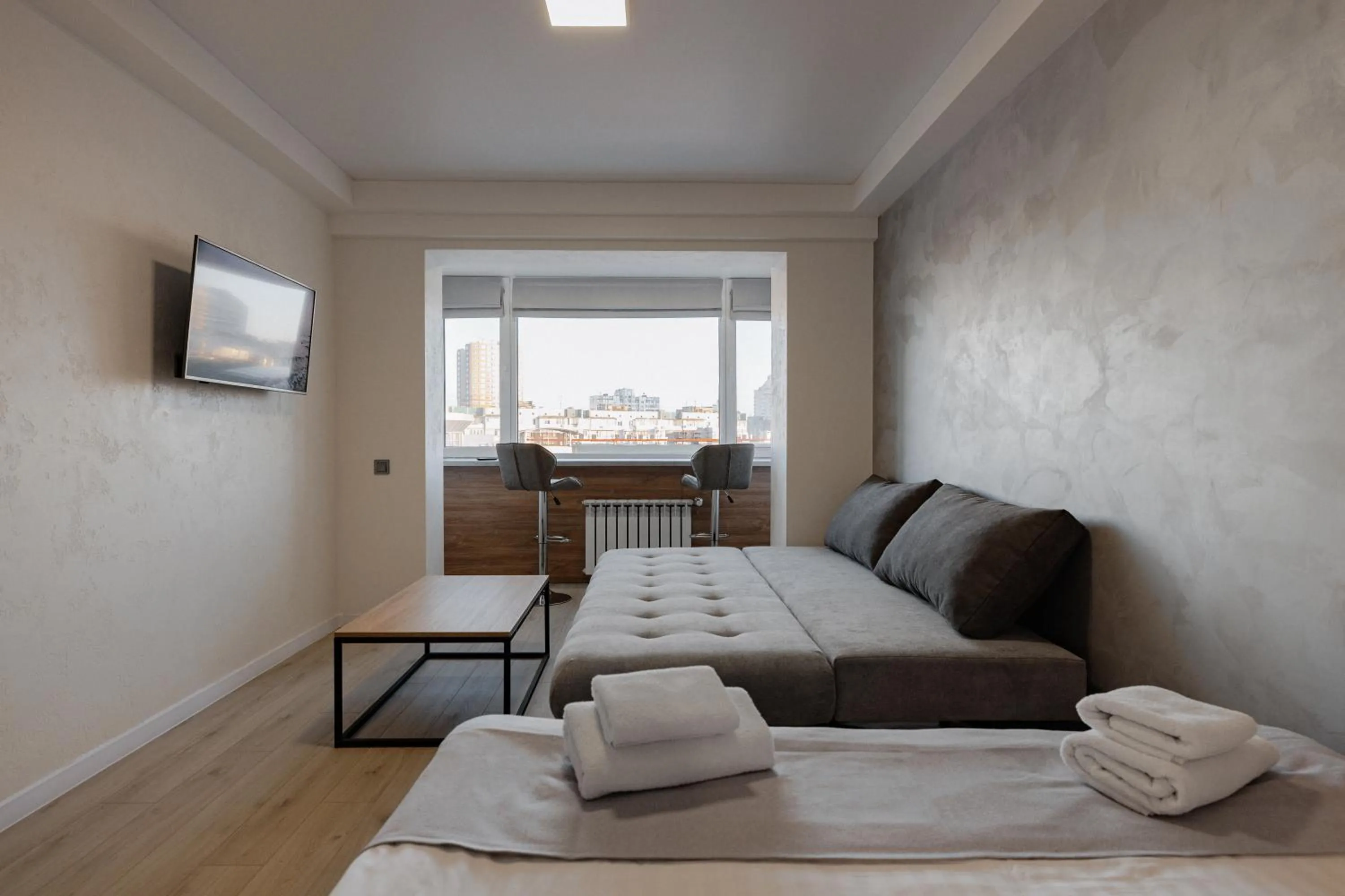 Living room, Bed in CityApartments Kyiv Obolon