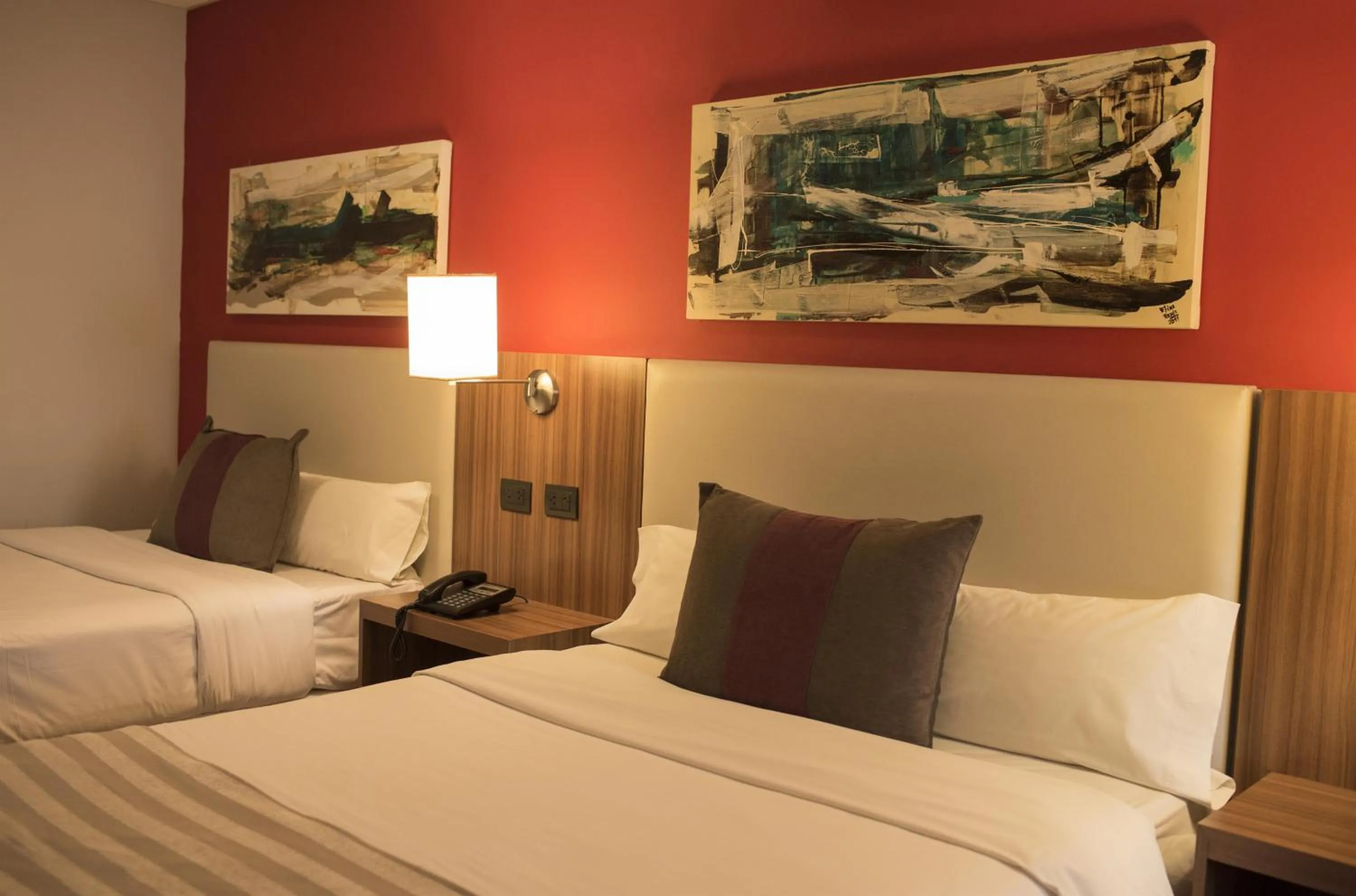 Bed in Hotel Bicentenario Suites & Spa