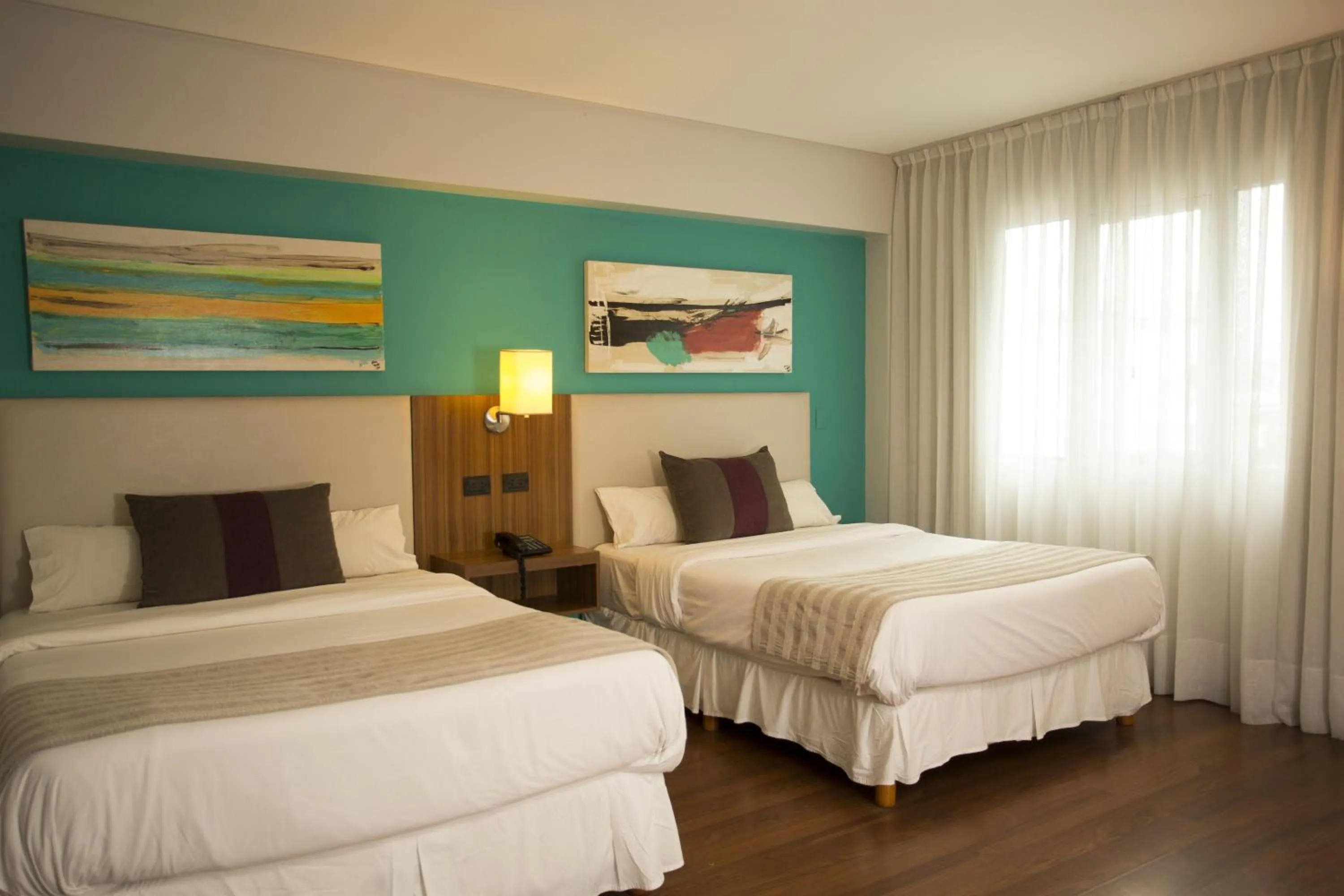 Photo of the whole room, Bed in Hotel Bicentenario Suites & Spa