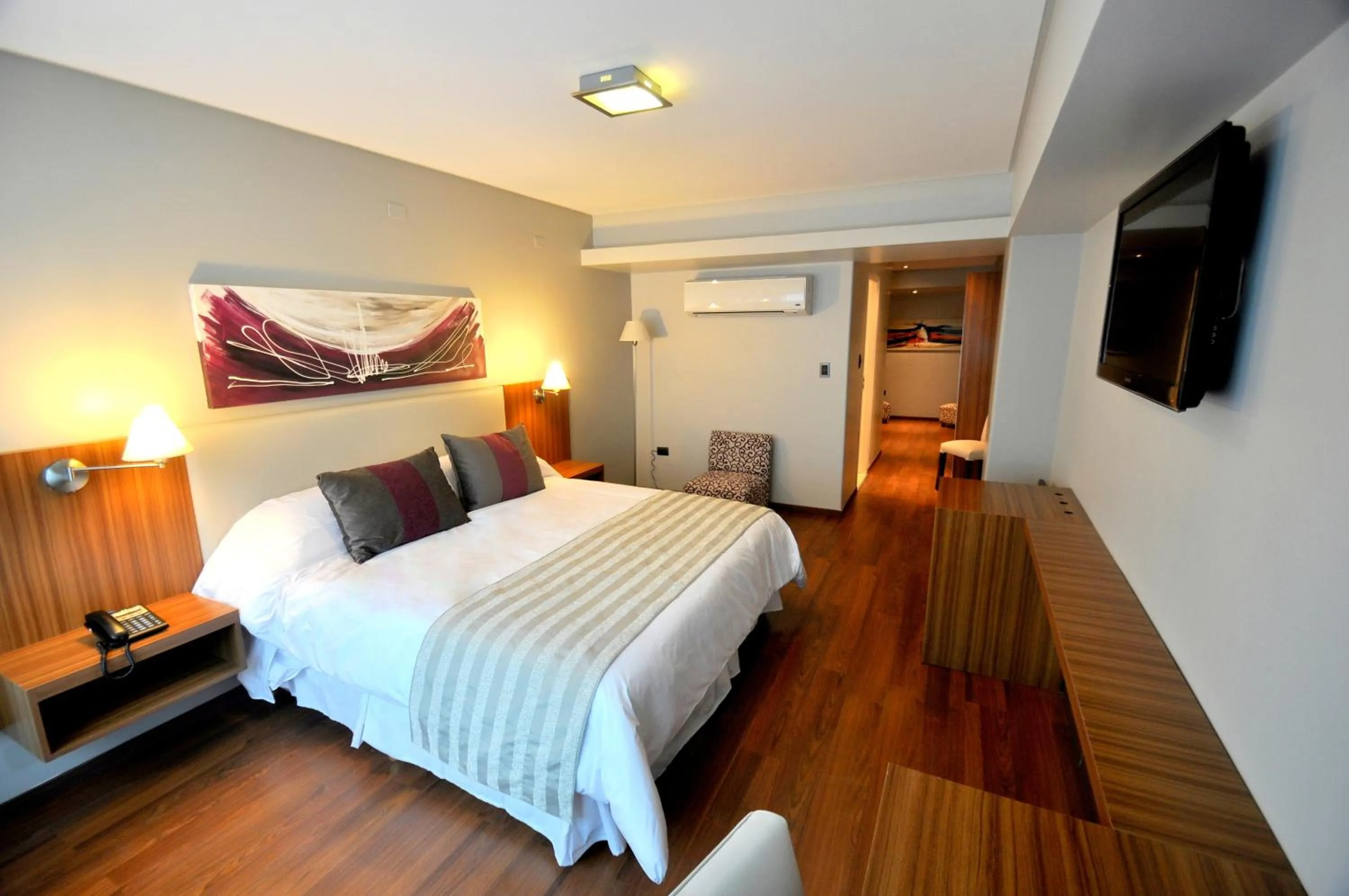 Bedroom, Bed in Hotel Bicentenario Suites & Spa