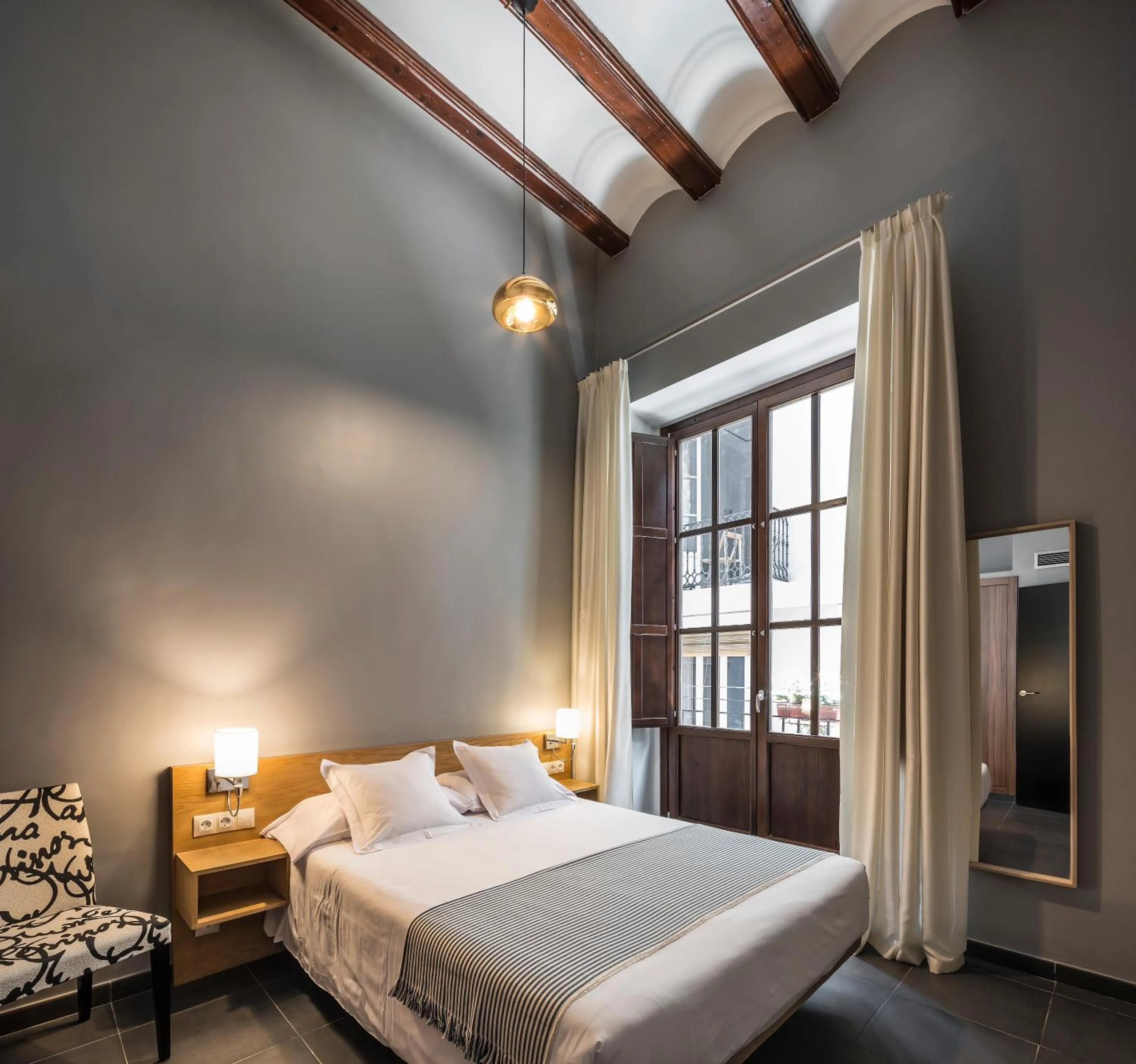 Bed in Catalina Suites San Nicolas