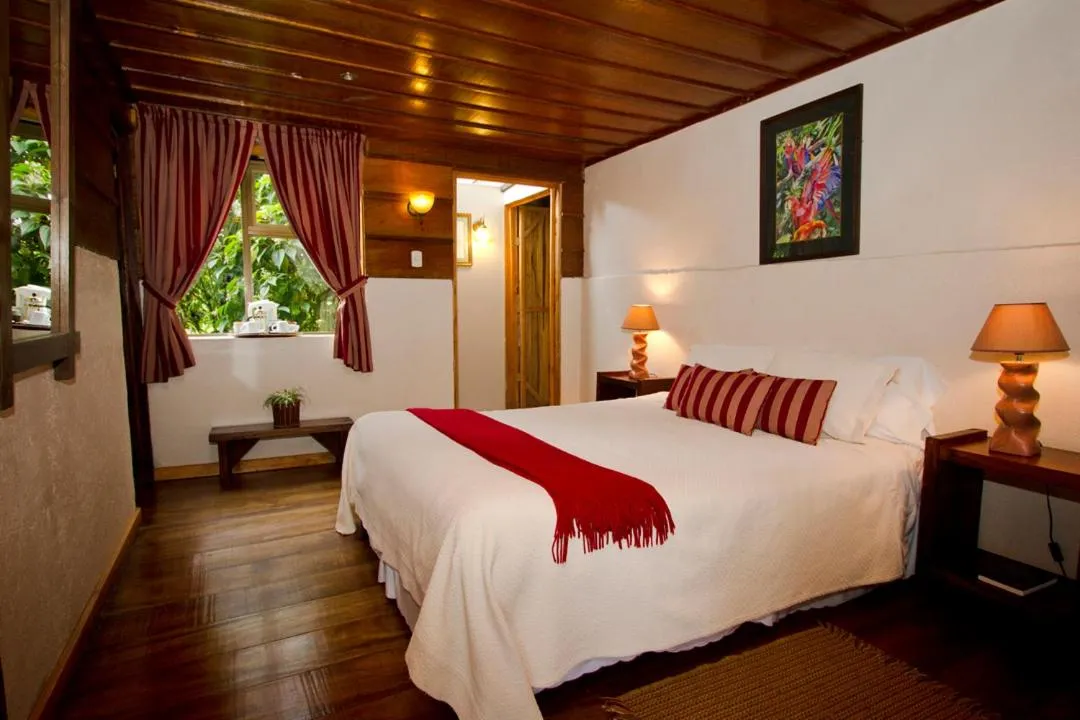 Bed in Poas Volcano Lodge