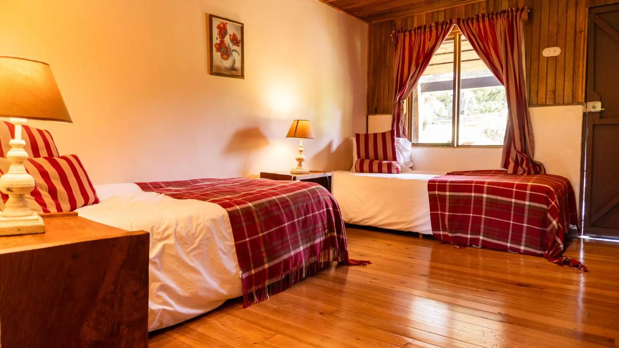 Bed in Poas Volcano Lodge