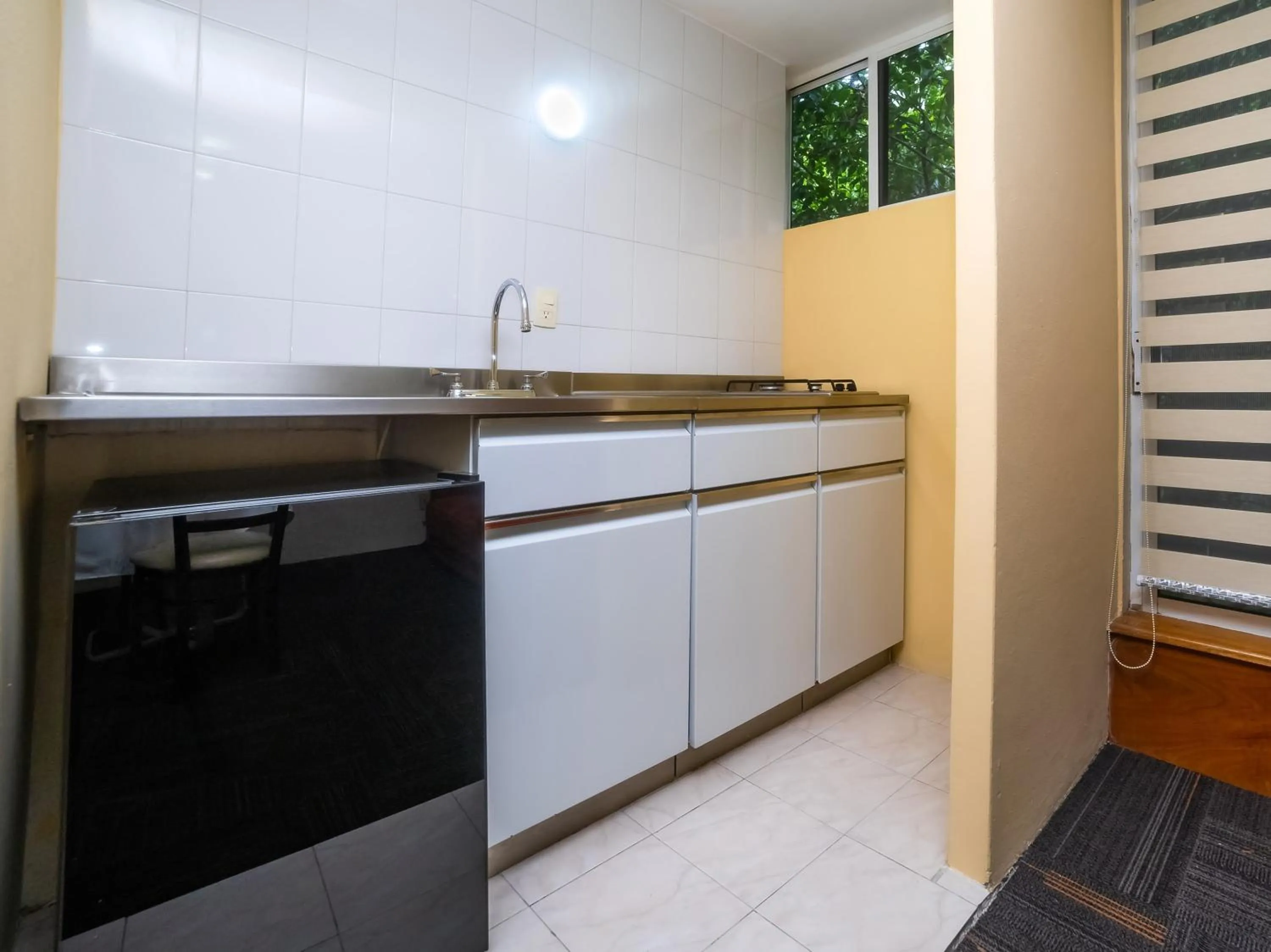 Bedroom in Capital O Hotel Suites Marne, Mexico City