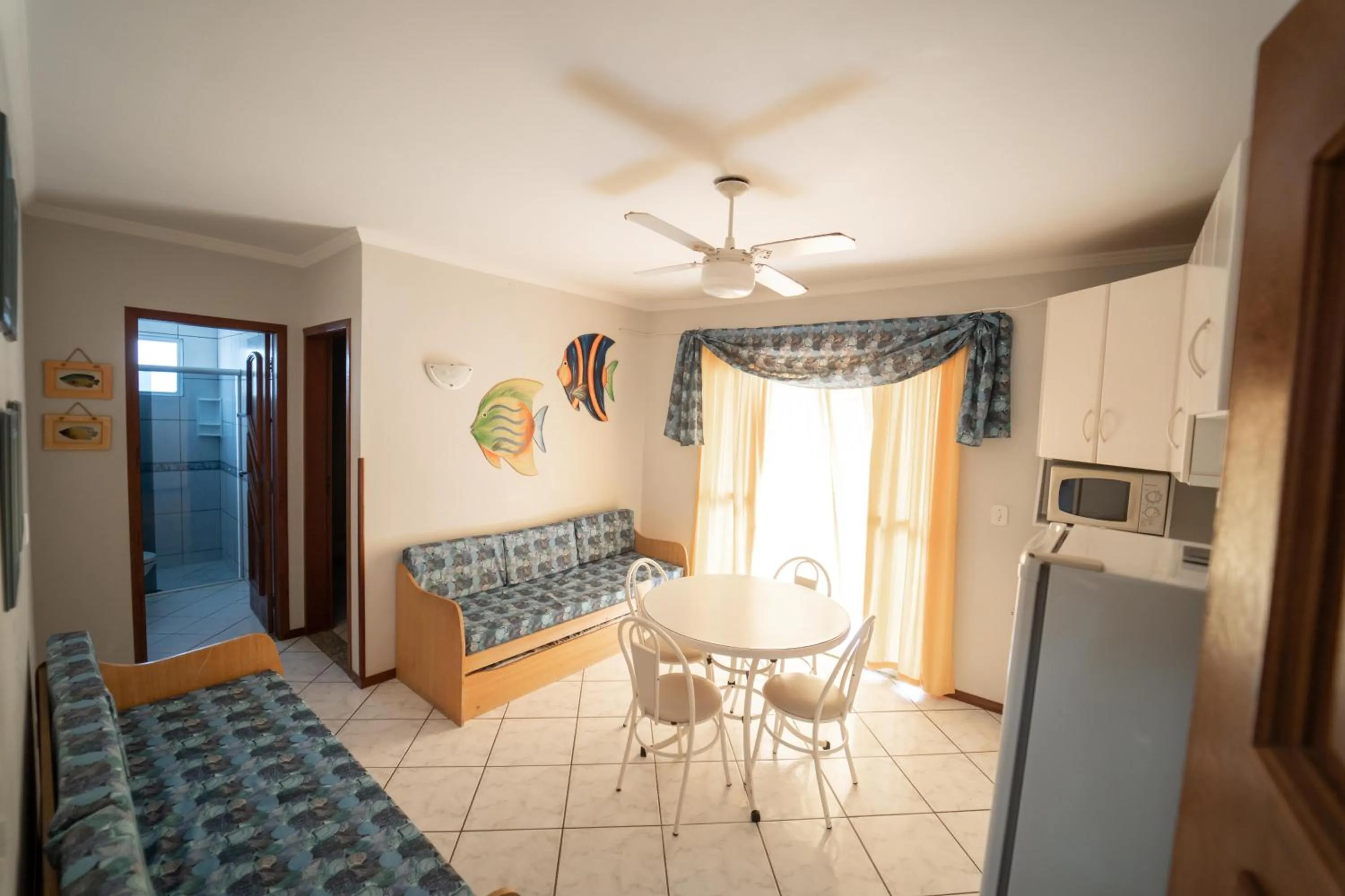 Living room, Bed in Pousada Cantinho Sonhado