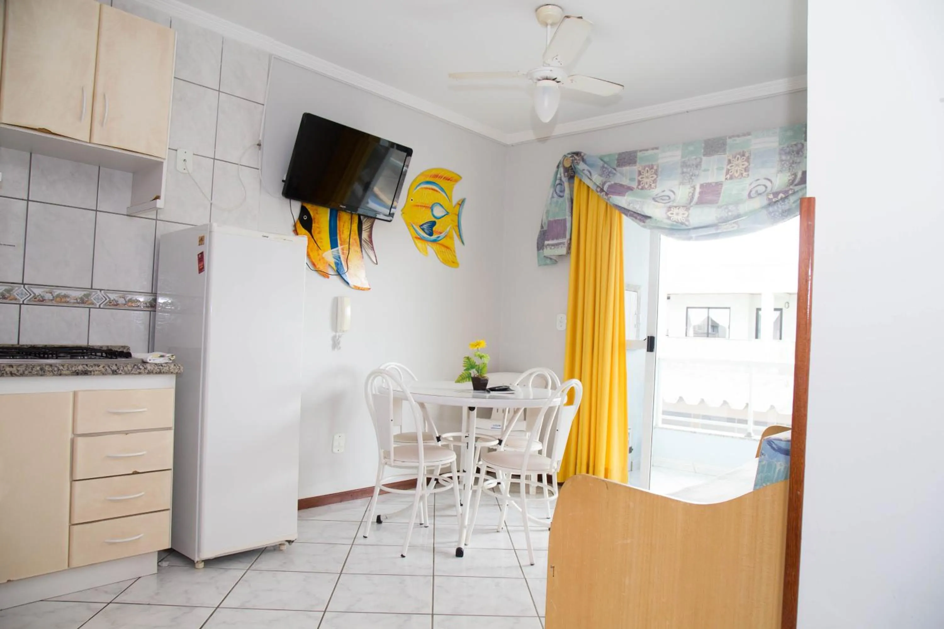 Kitchen or kitchenette in Pousada Cantinho Sonhado