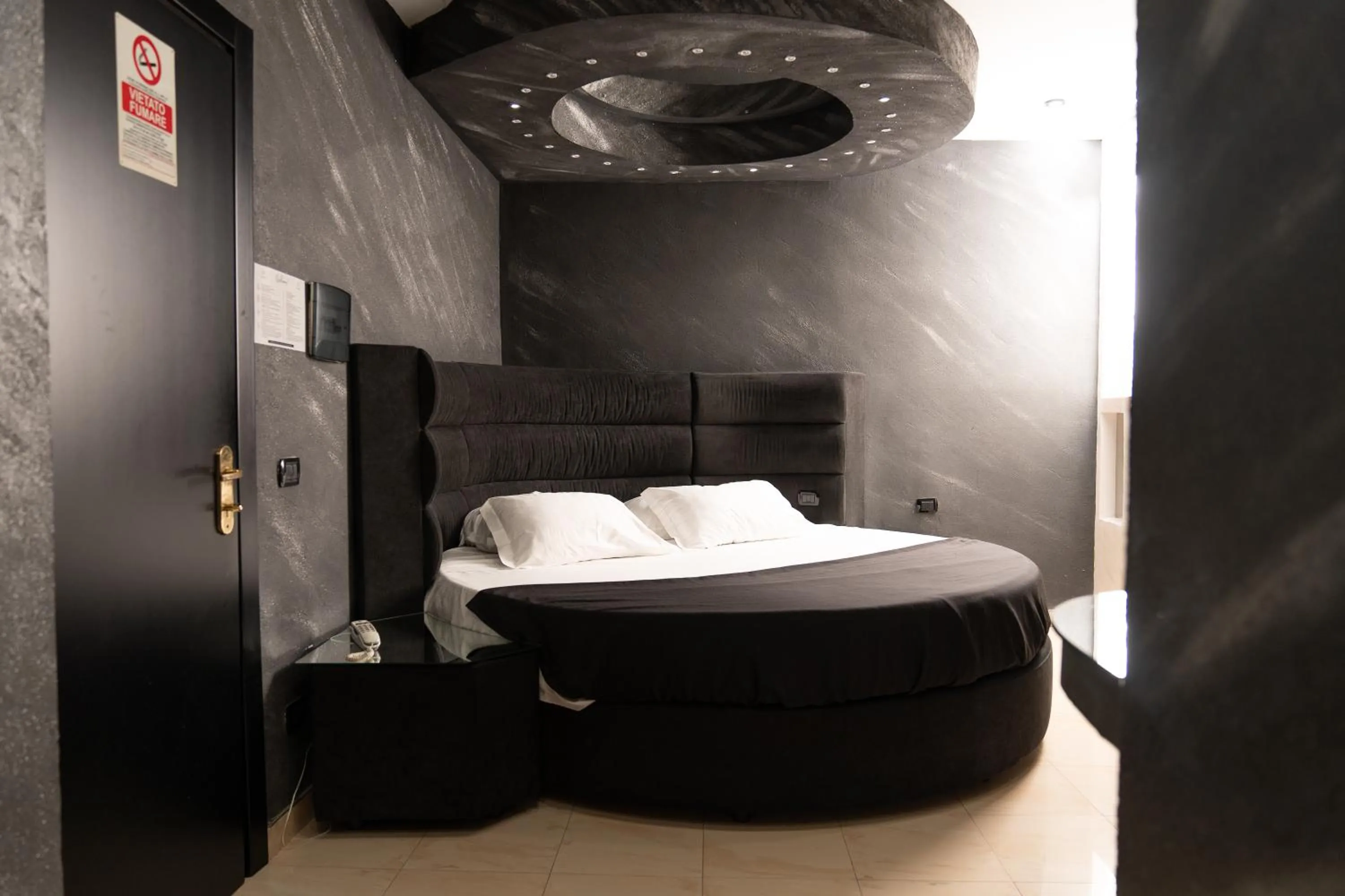 Bed in Hotel Paradiso