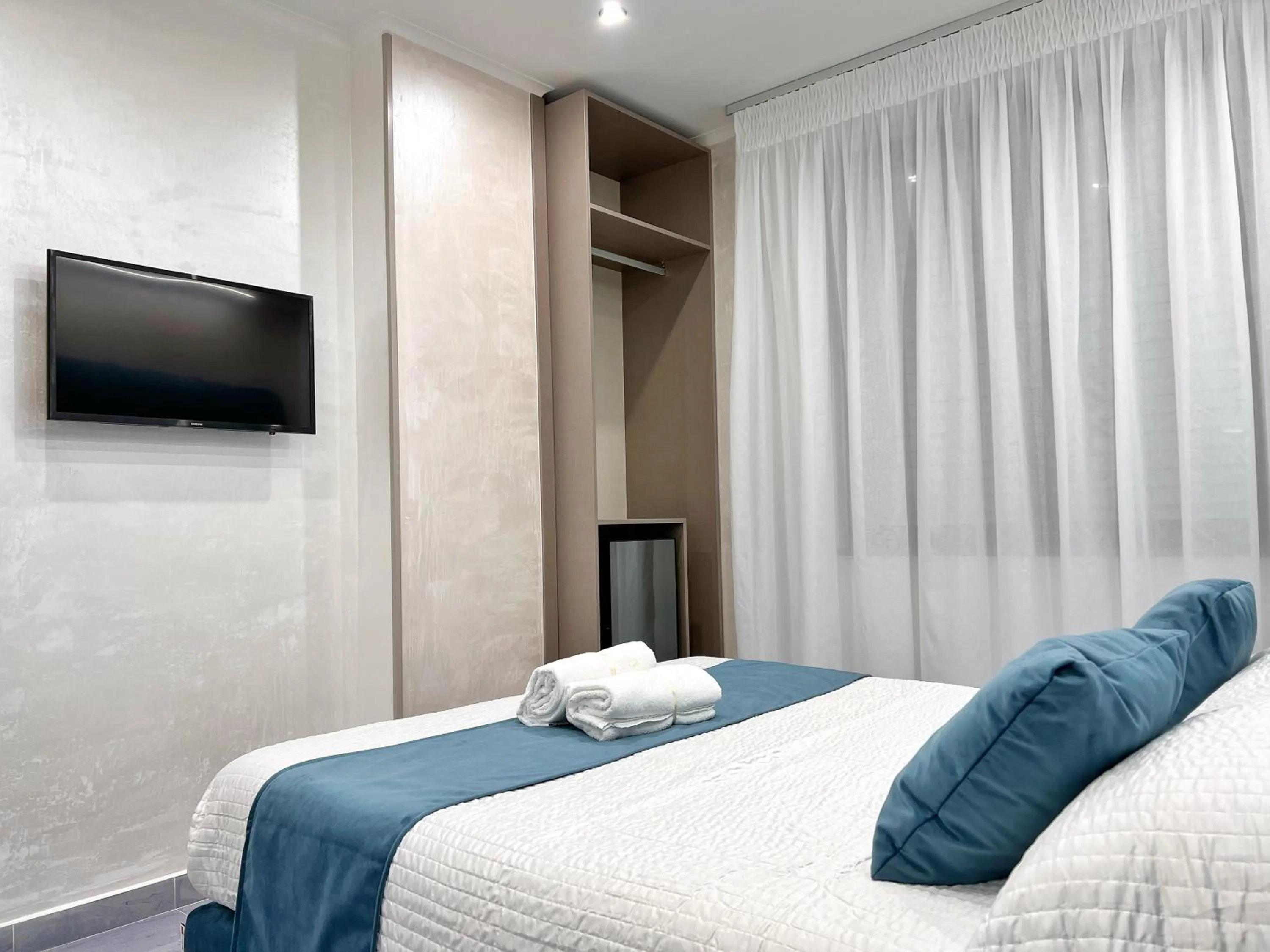 Bed in Hotel Paradiso