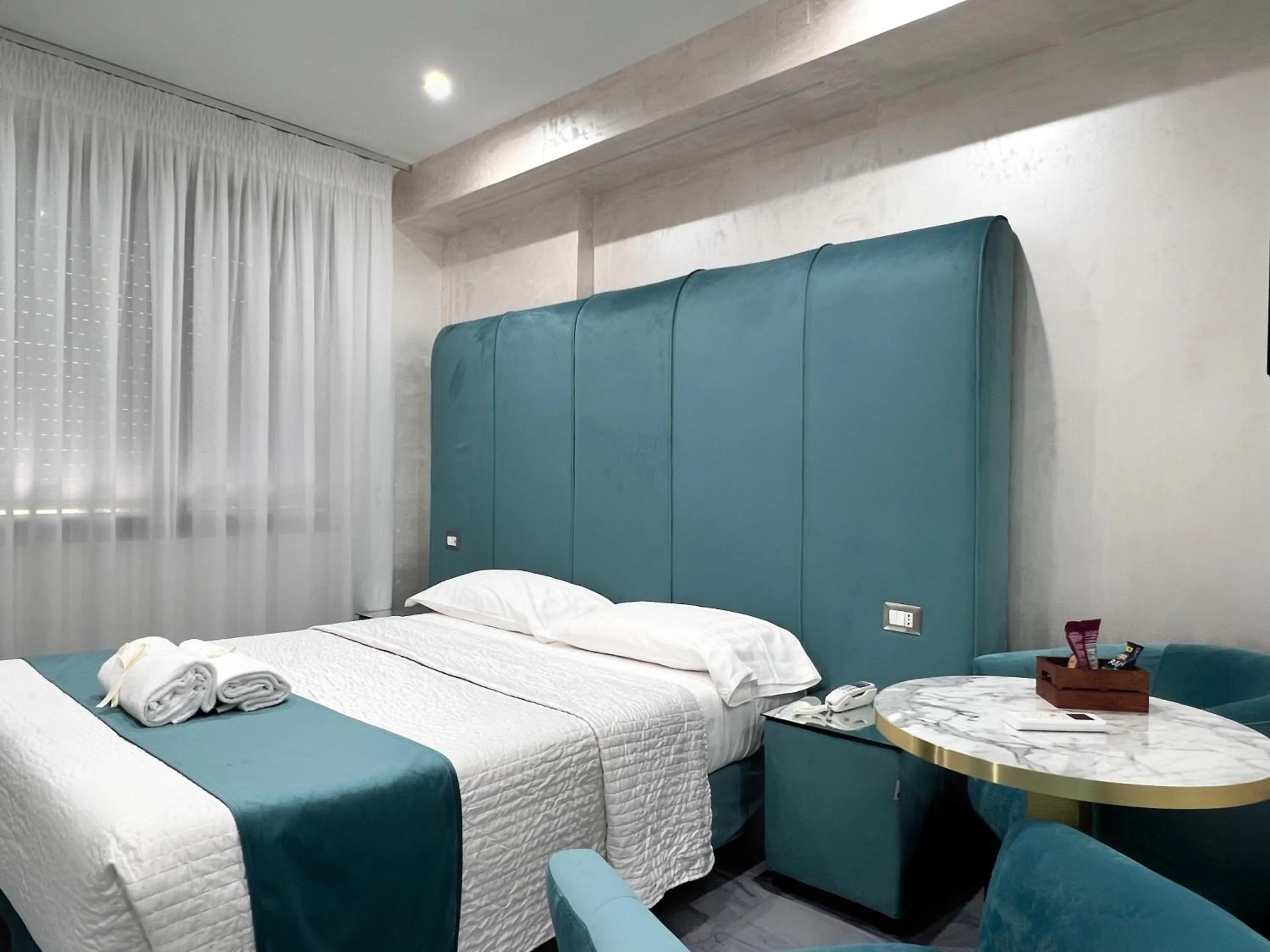 Bed in Hotel Paradiso