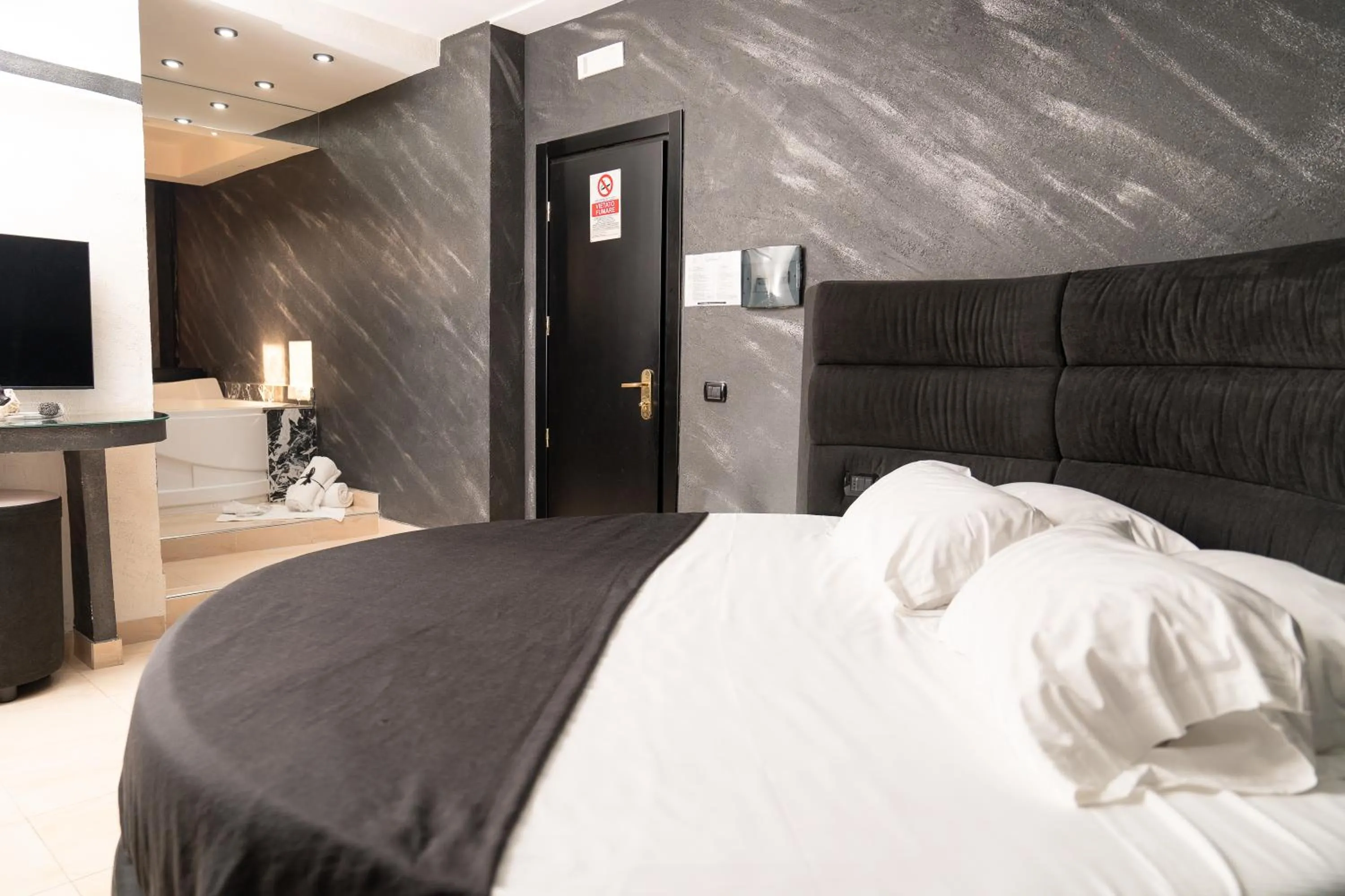 Bed in Hotel Paradiso