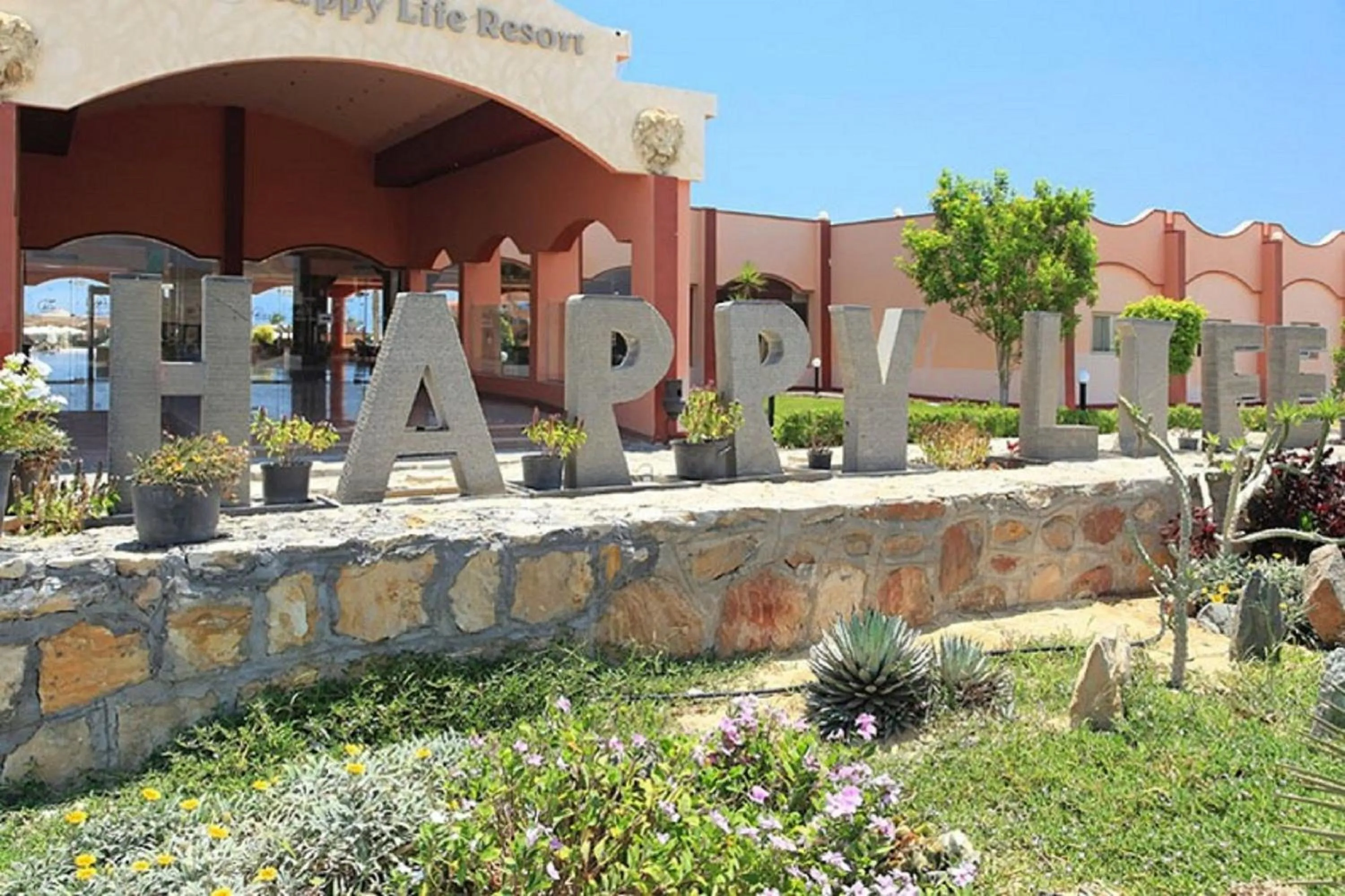 Facade/entrance in Three Corners Happy Life Beach Resort