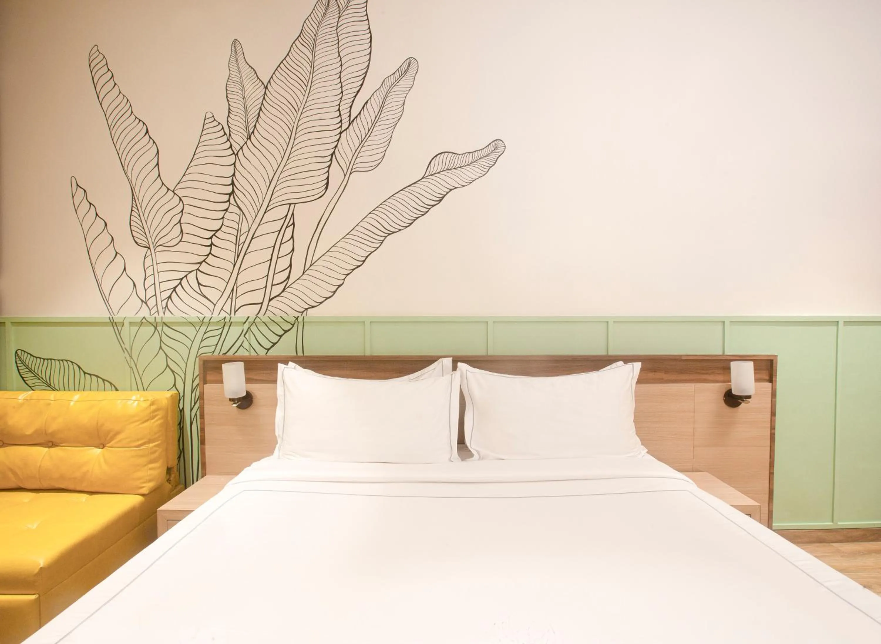 Bed in Hotel Bawa Regency