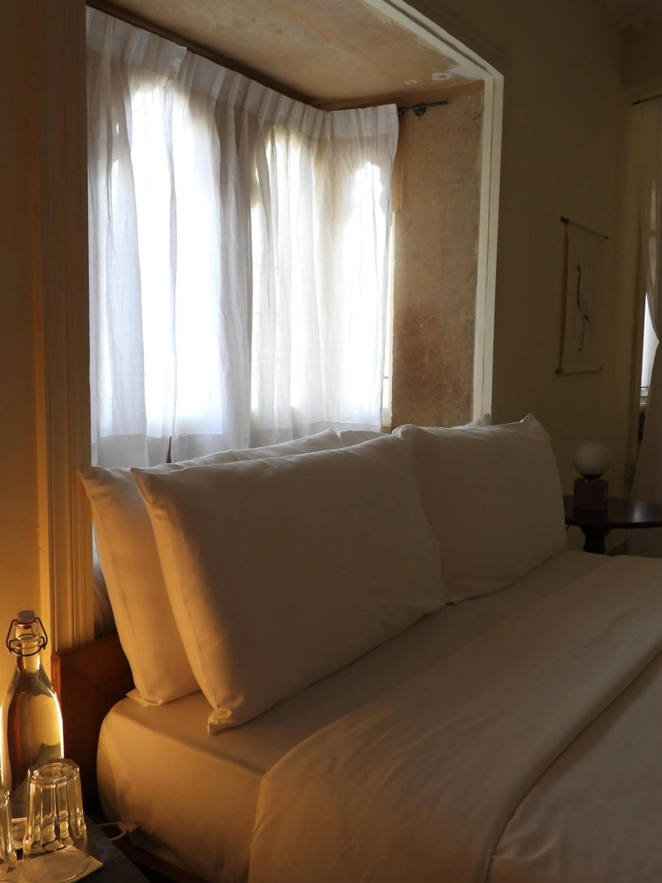 Bed in The Stepwell Hotel