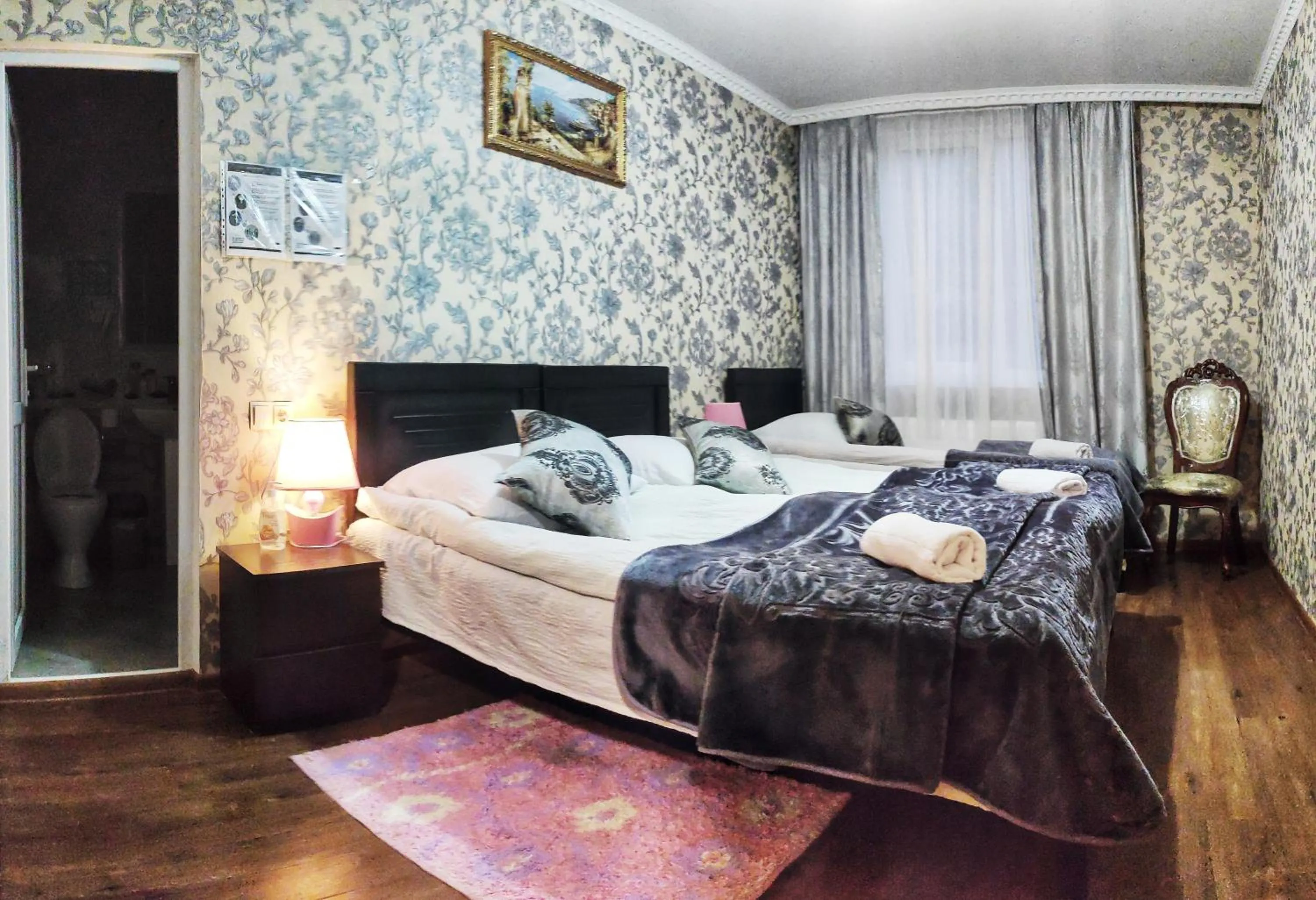 Bed in Sophia's GuestHouse
