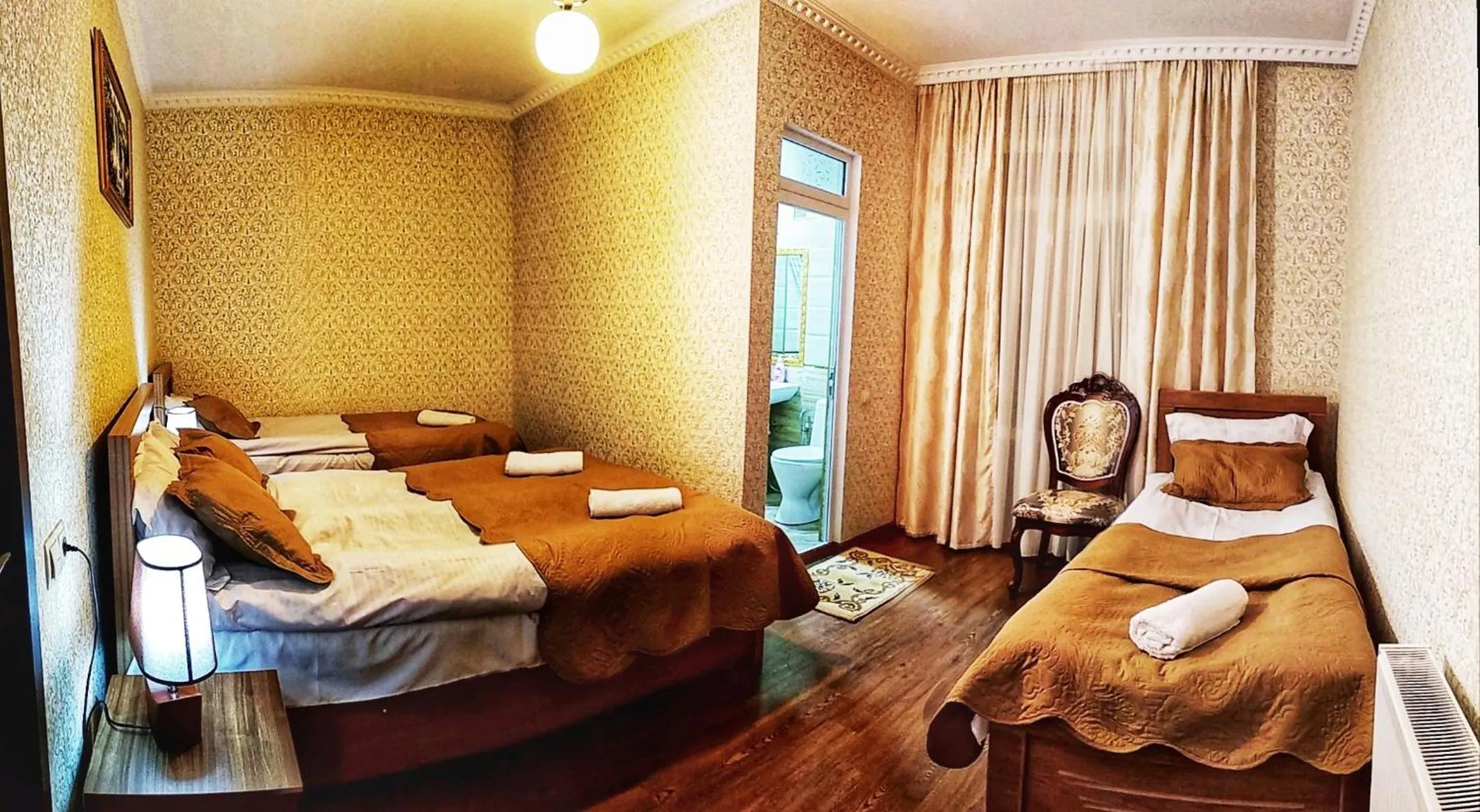 Bed in Sophia's GuestHouse