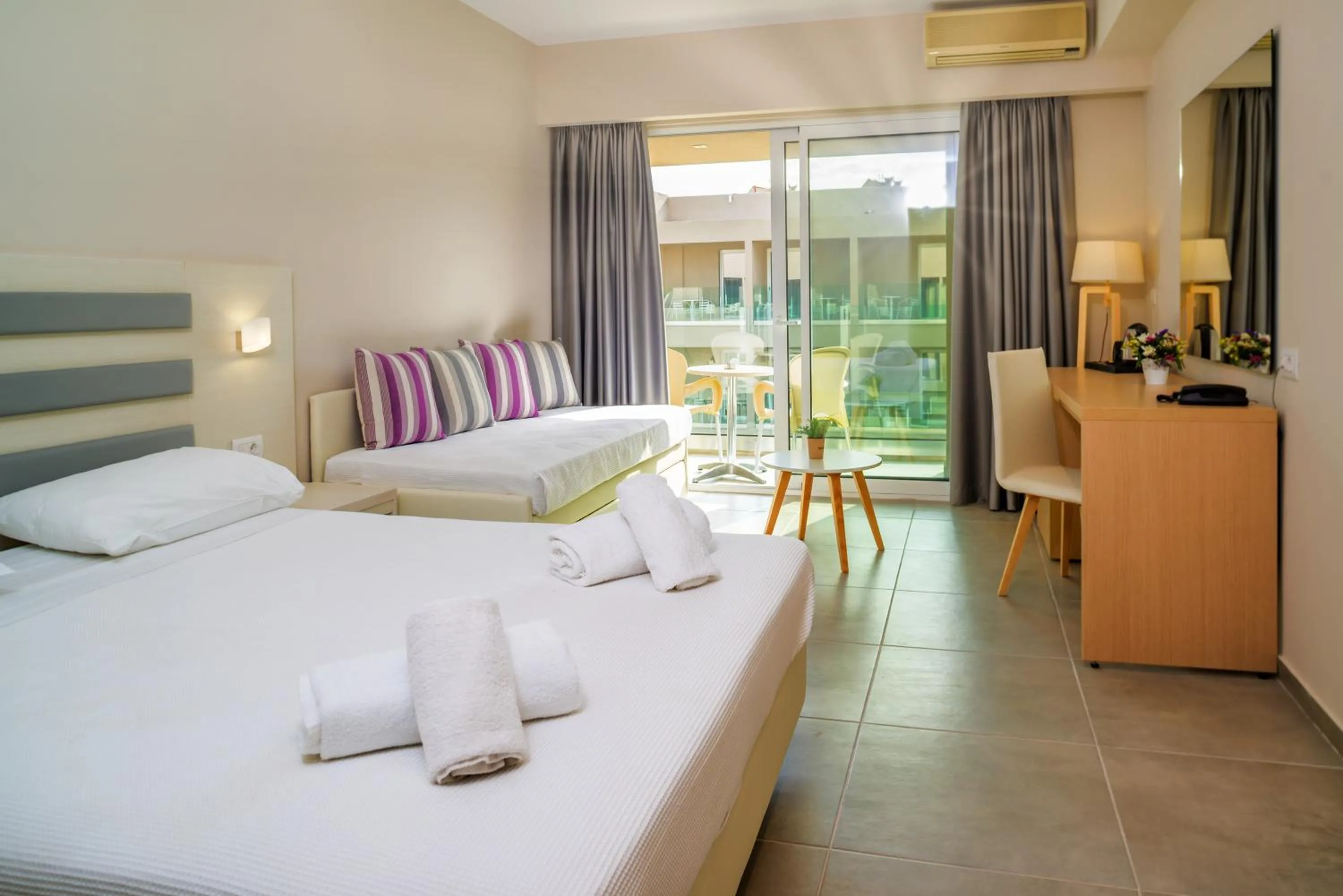 Bed in CNic Gemini Hotel