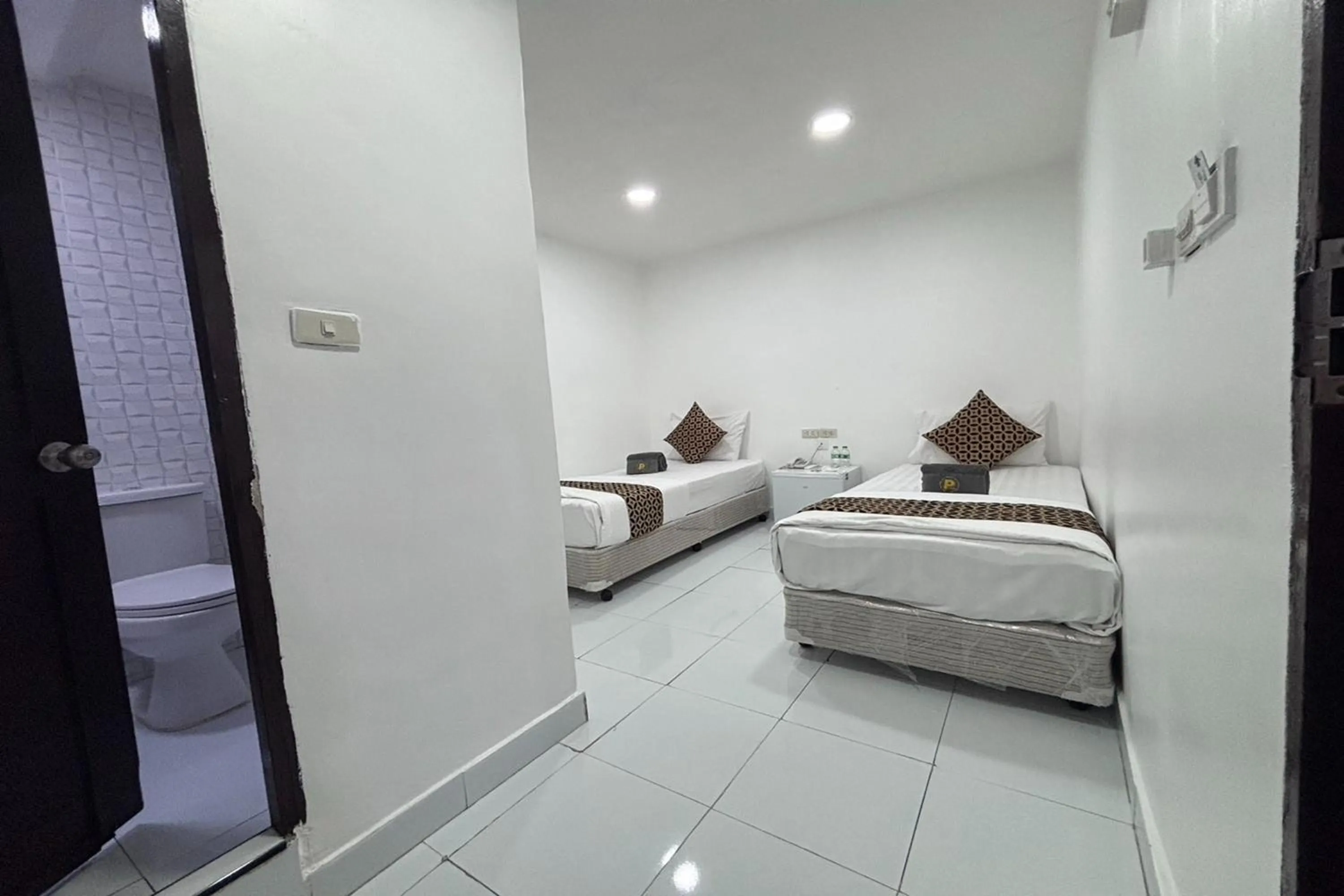 Bed in Papa Ji Hotel and Restaurant