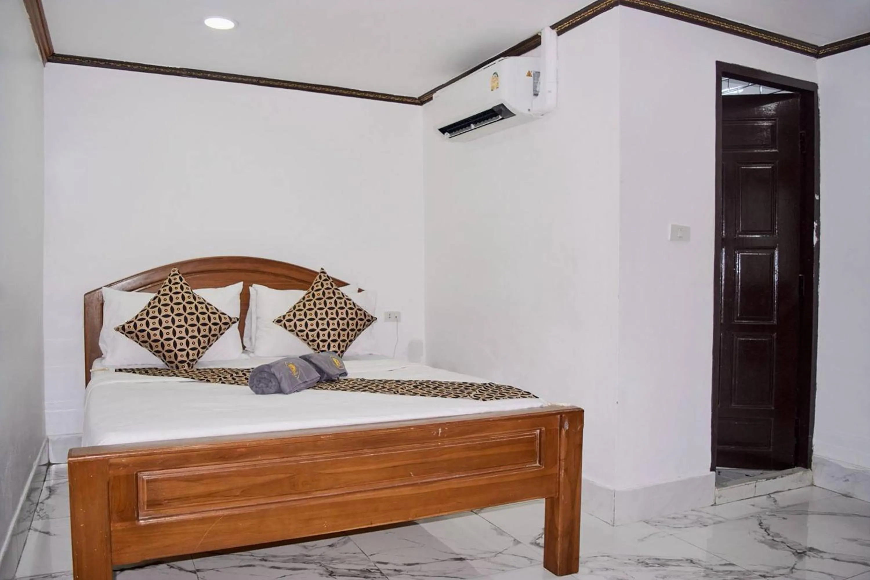 Bed in Papa Ji Hotel and Restaurant