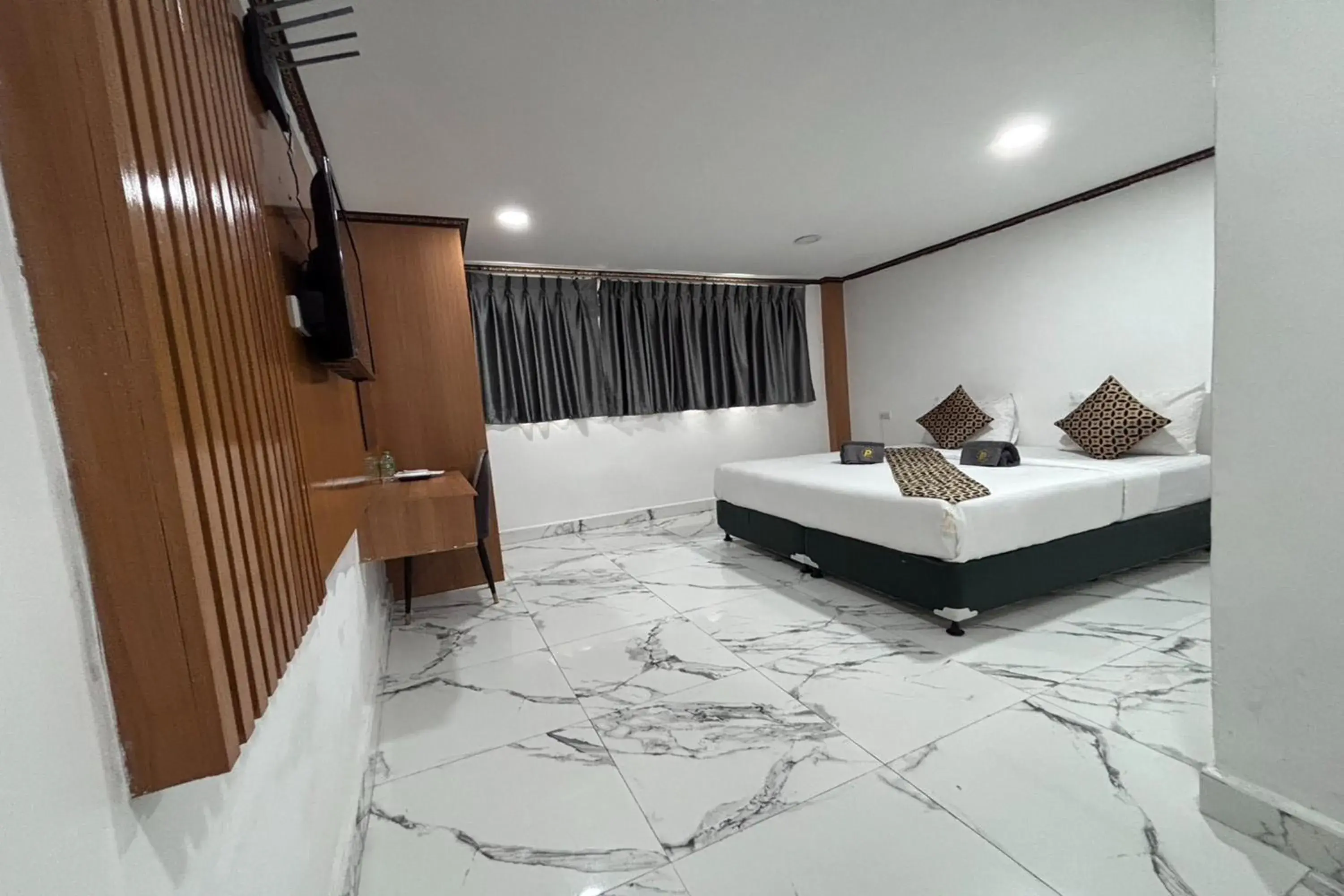 Bed in Papa Ji Hotel and Restaurant Bed in Papa Ji Hotel and Restaurant