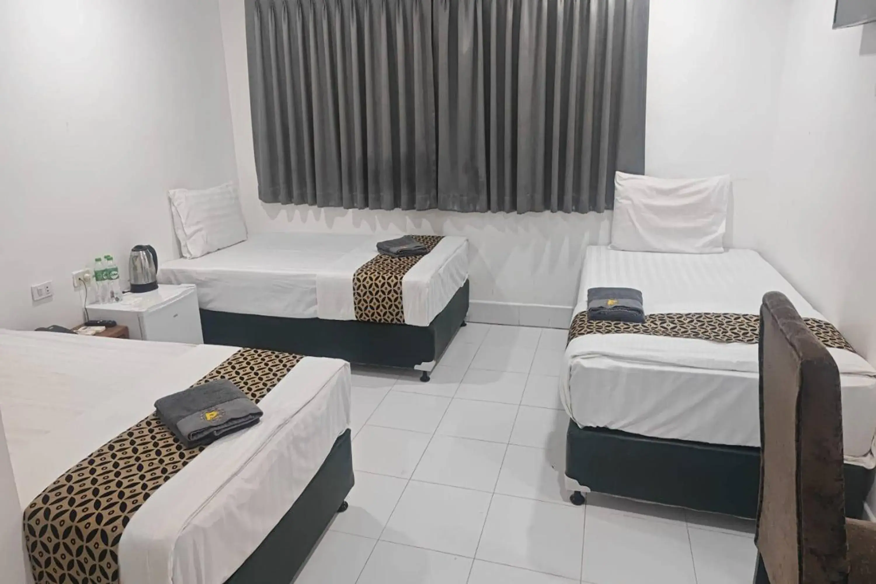 Triple Room in Papa Ji Hotel and Restaurant Triple Room in Papa Ji Hotel and Restaurant