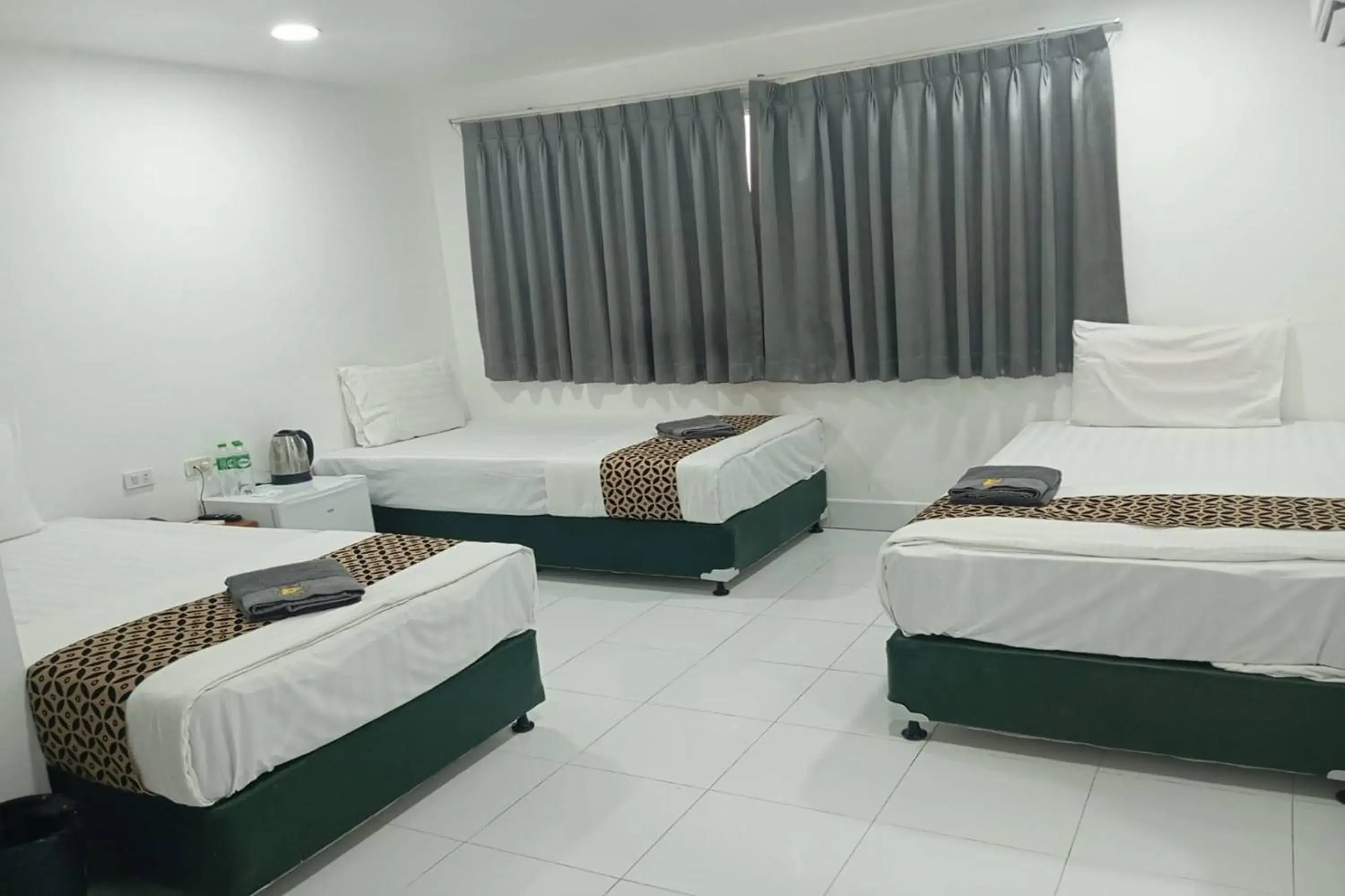 Triple Room in Papa Ji Hotel and Restaurant Triple Room in Papa Ji Hotel and Restaurant