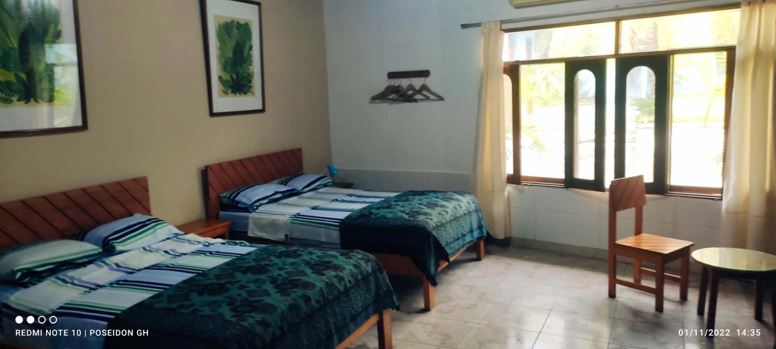 Bed in Poseidon Guest House