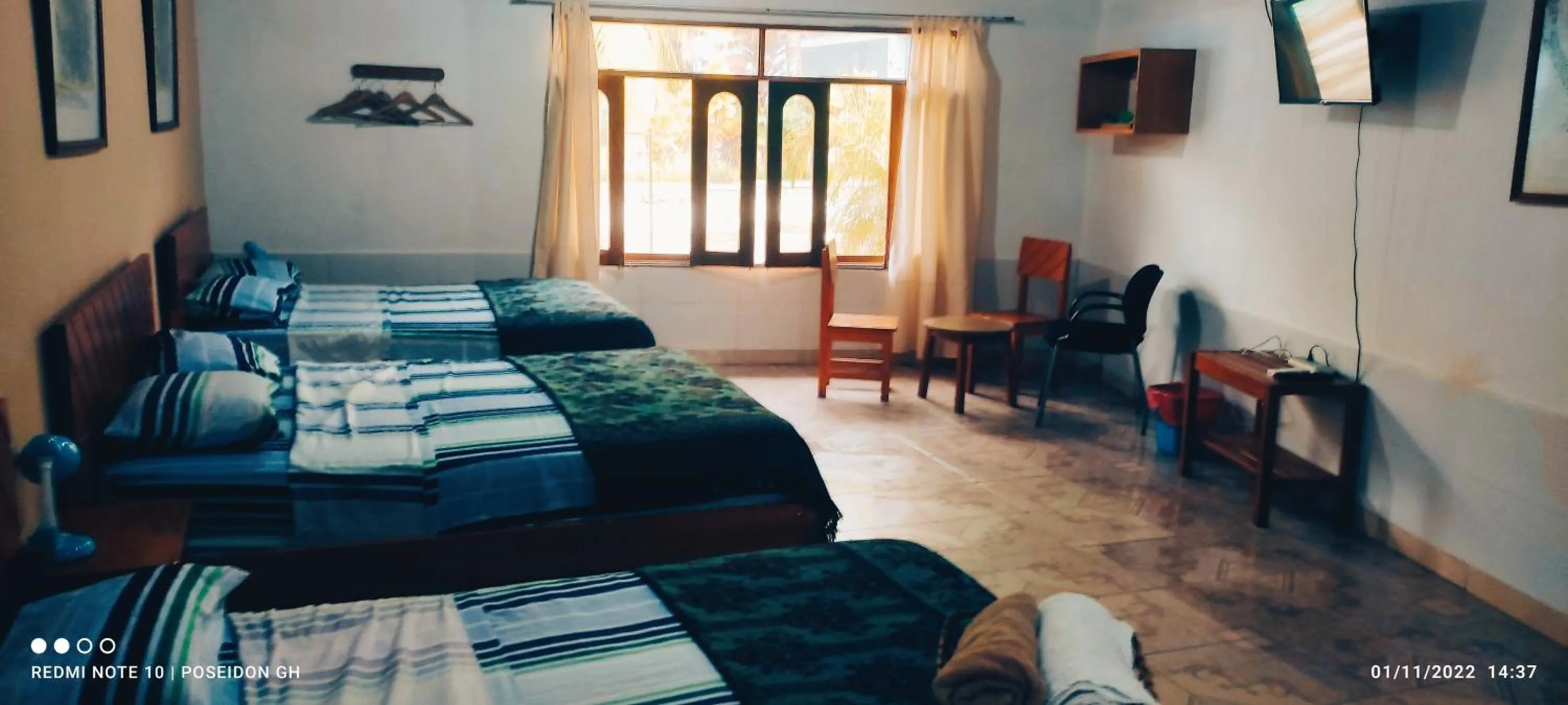 Bed in Poseidon Guest House