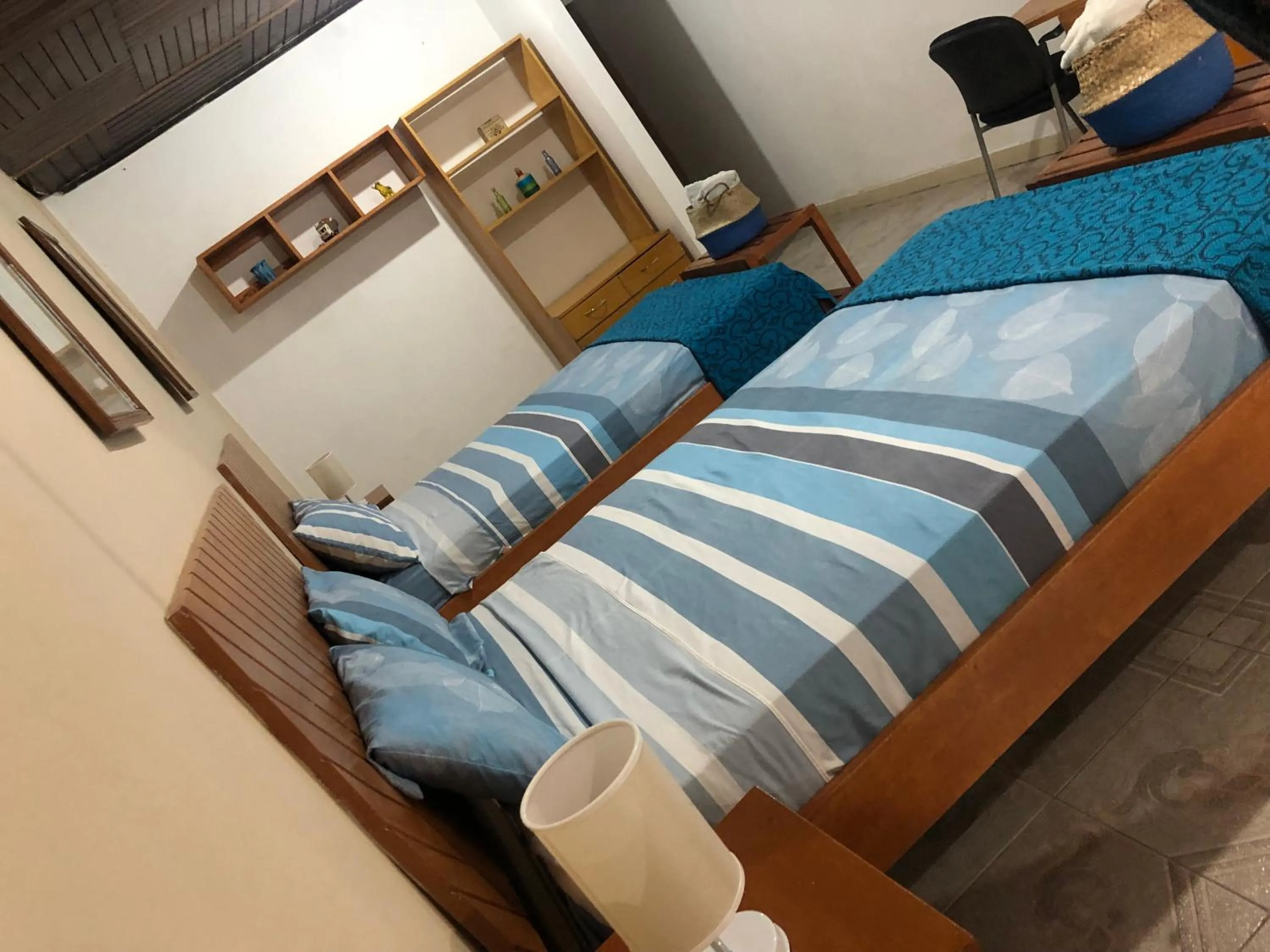 Bed in Poseidon Guest House
