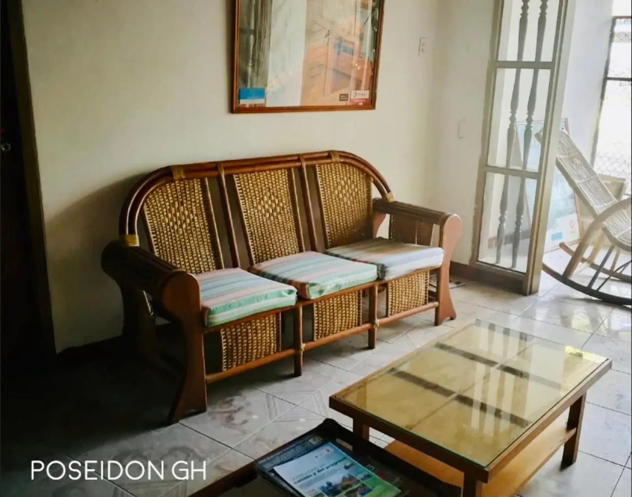 Communal lounge/ TV room in Poseidon Guest House