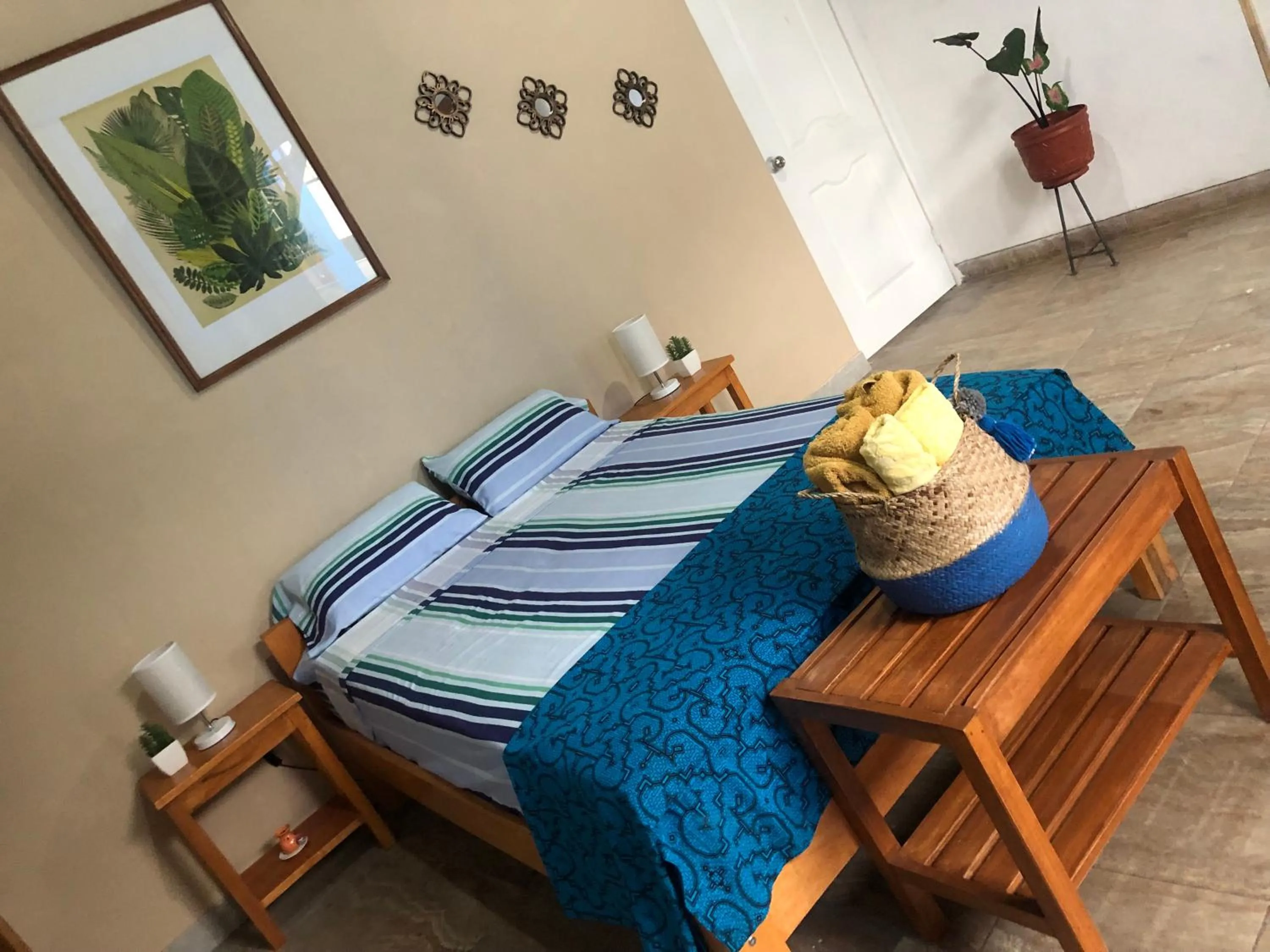 Bed in Poseidon Guest House