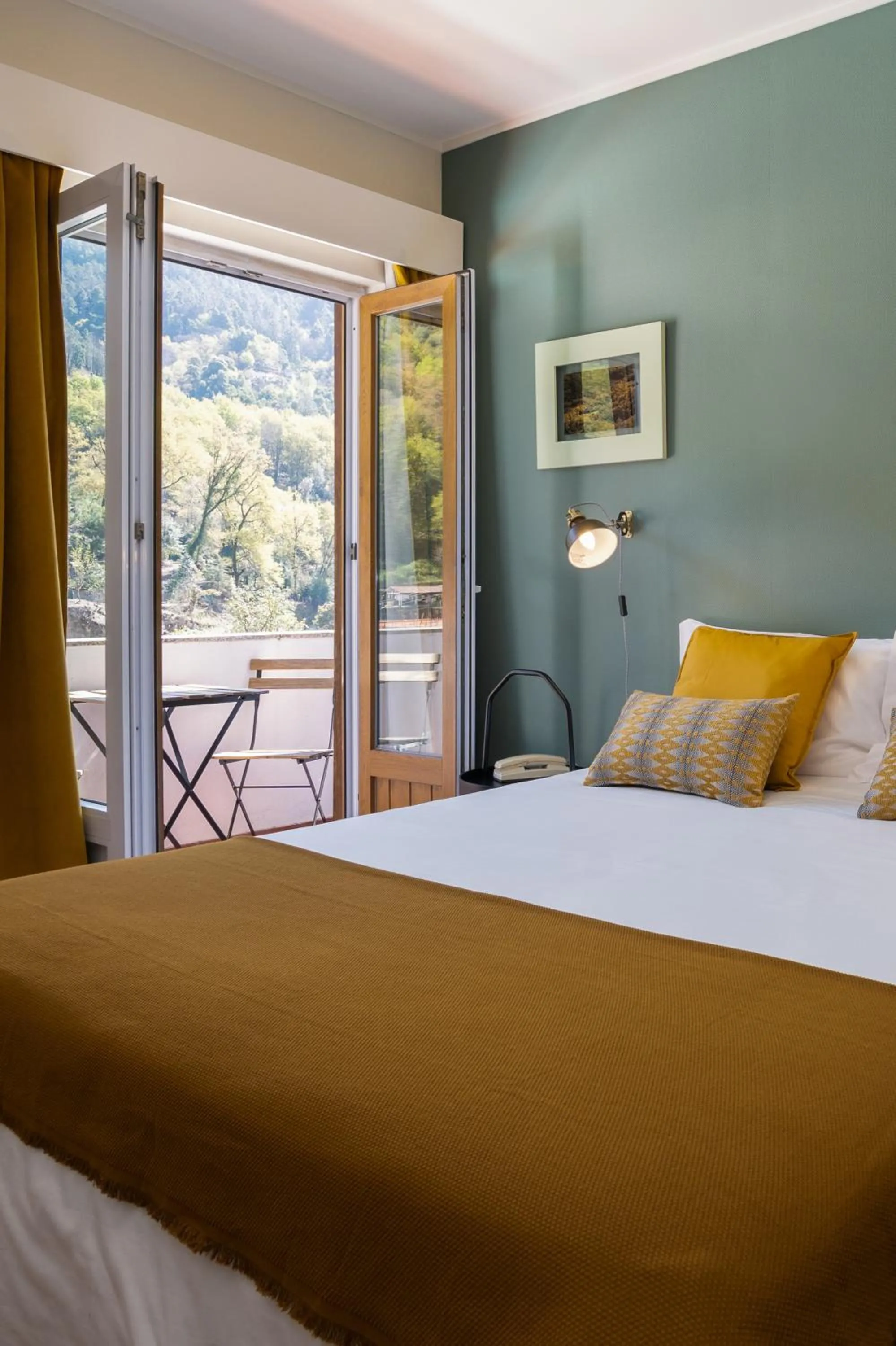 Bed in Hotel Carvalho Araujo