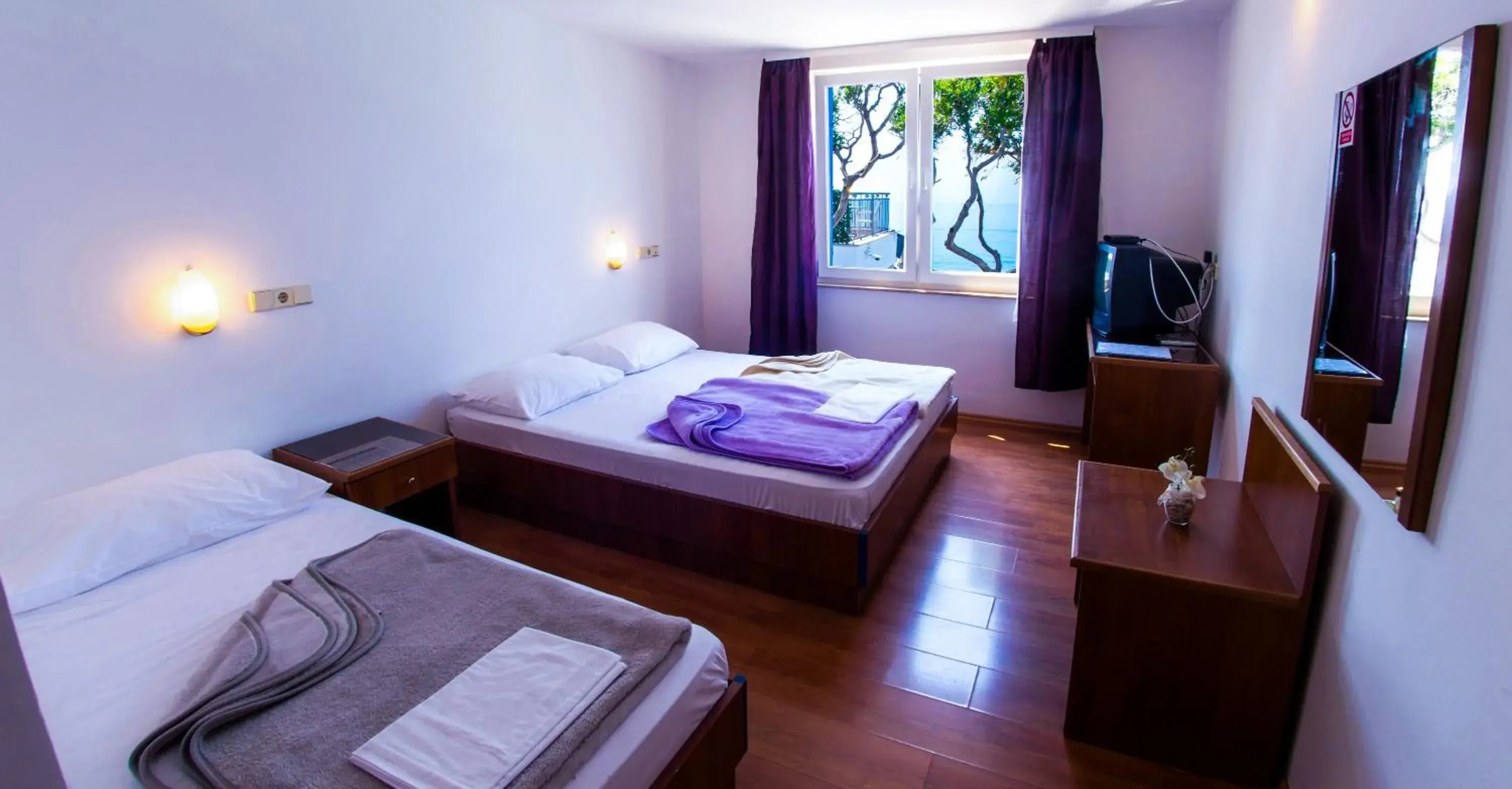 Photo of the whole room, Bed in Beach Hotel Photo of the whole room, Bed in Beach Hotel