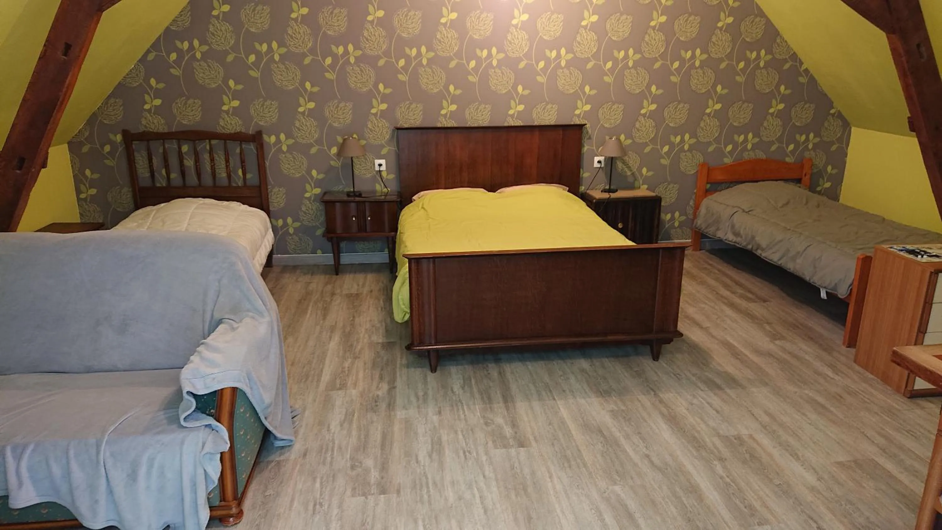 Bed in Les Chambres du Relais