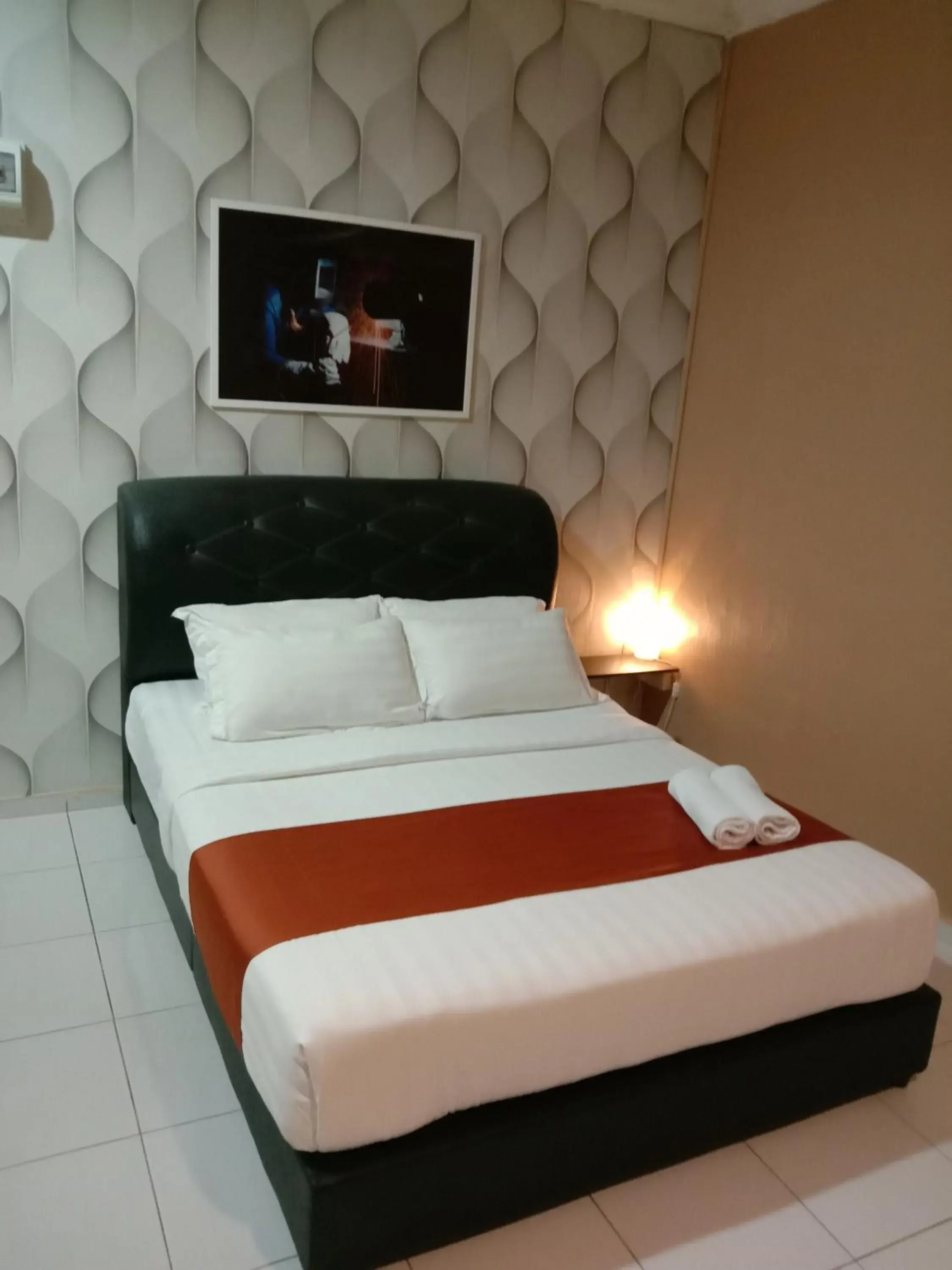 Bed in NDE Hotel Bed in NDE Hotel